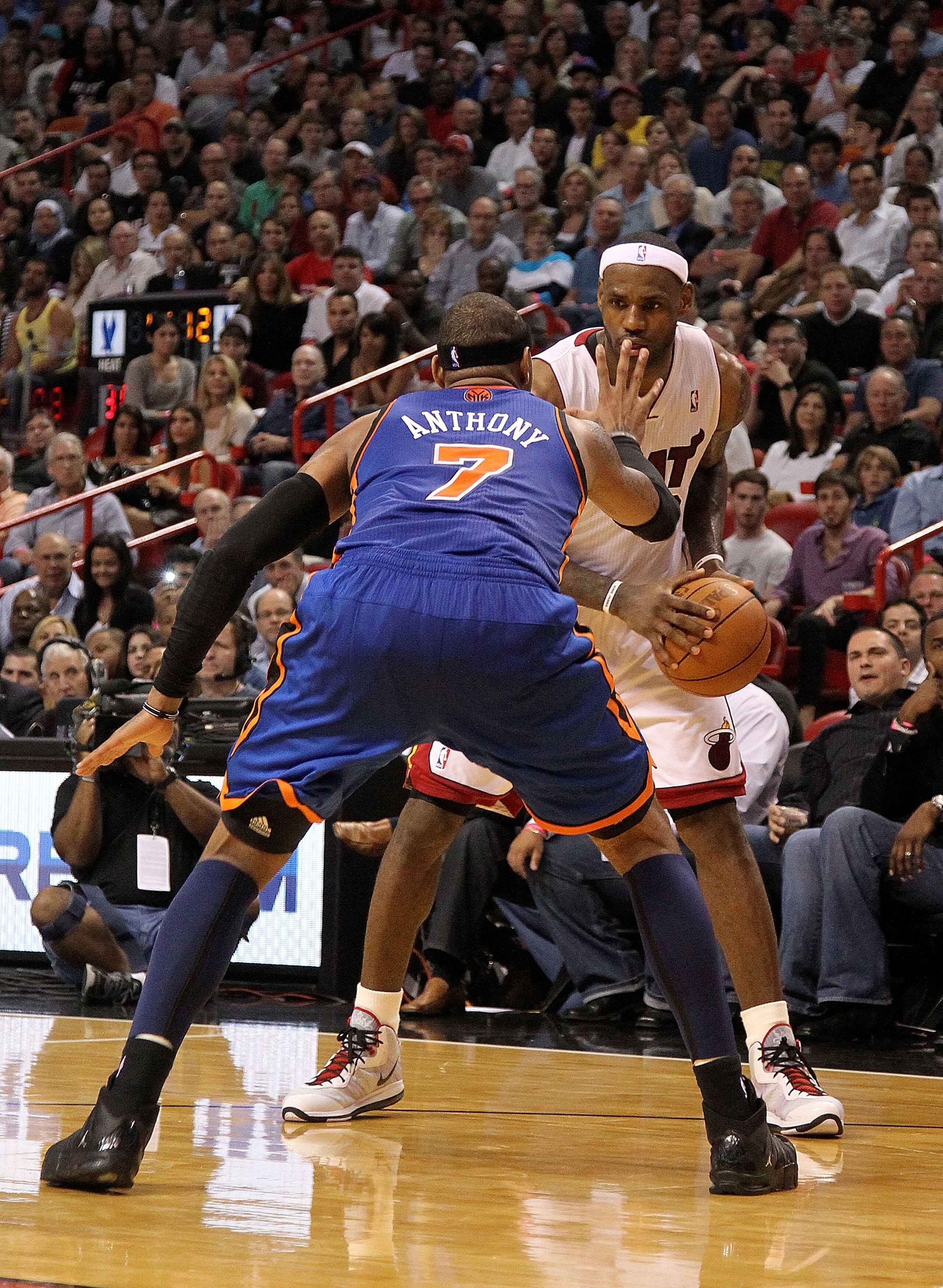 MIAMI, FL - FEBRUARY 27:  LeBron James #6 of the Miami Heat is guarded by Carmelo Anthony #7 of the New York Knicks looks on during a game at American Airlines Arena on February 27, 2011 in Miami, Florida. NOTE TO USER: User expressly acknowledges and agr