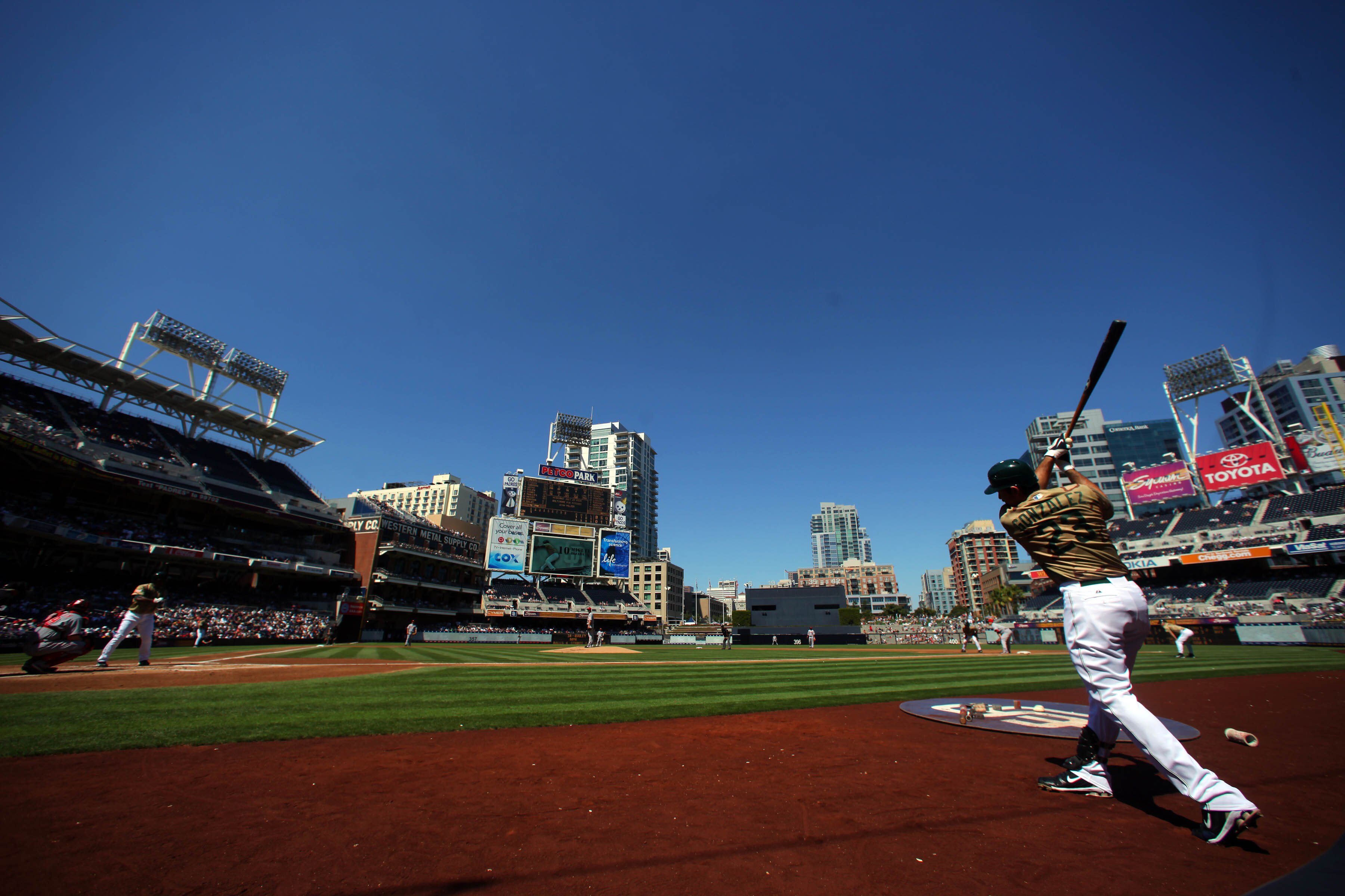 SAN DIEGO, CA - SEPTEMBER 26:  Adrian Gonzalez #23 of the San Diego Padres prepares himself in the on deck circle against  the Cincinnati Reds during their MLB game on September 26, 2010 at PETCO Park in San Diego, California. (Photo by Donald Miralle/Get