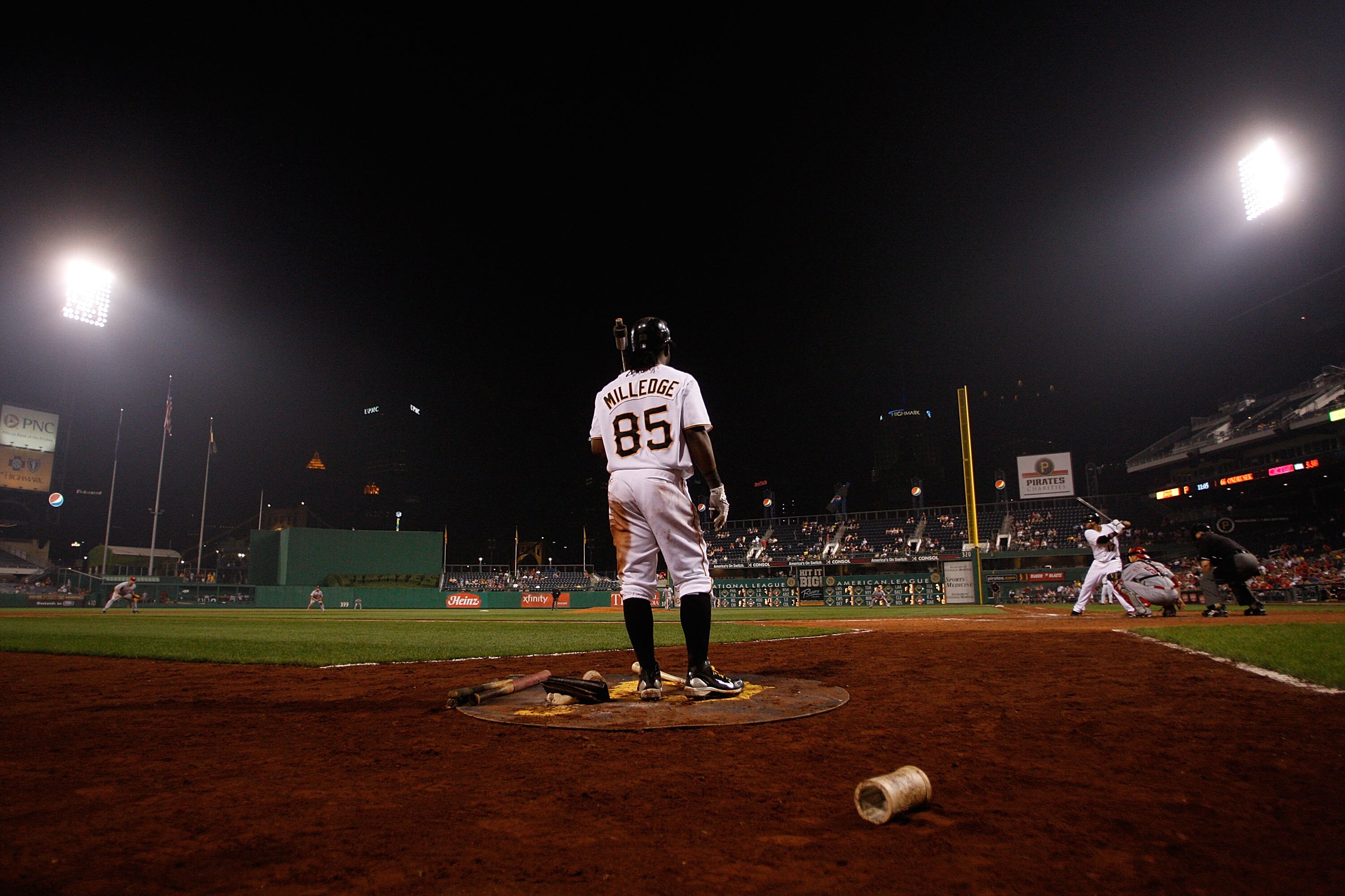 PITTSBURGH - AUGUST 03:  Lastings Milledge #85 of the Pittsburgh Pirates waits in the on deck circle while Pedro Alvarez #17 bats against the Cincinnati Reds during the game on August 3, 2010 at PNC Park in Pittsburgh, Pennsylvania.  (Photo by Jared Wicke