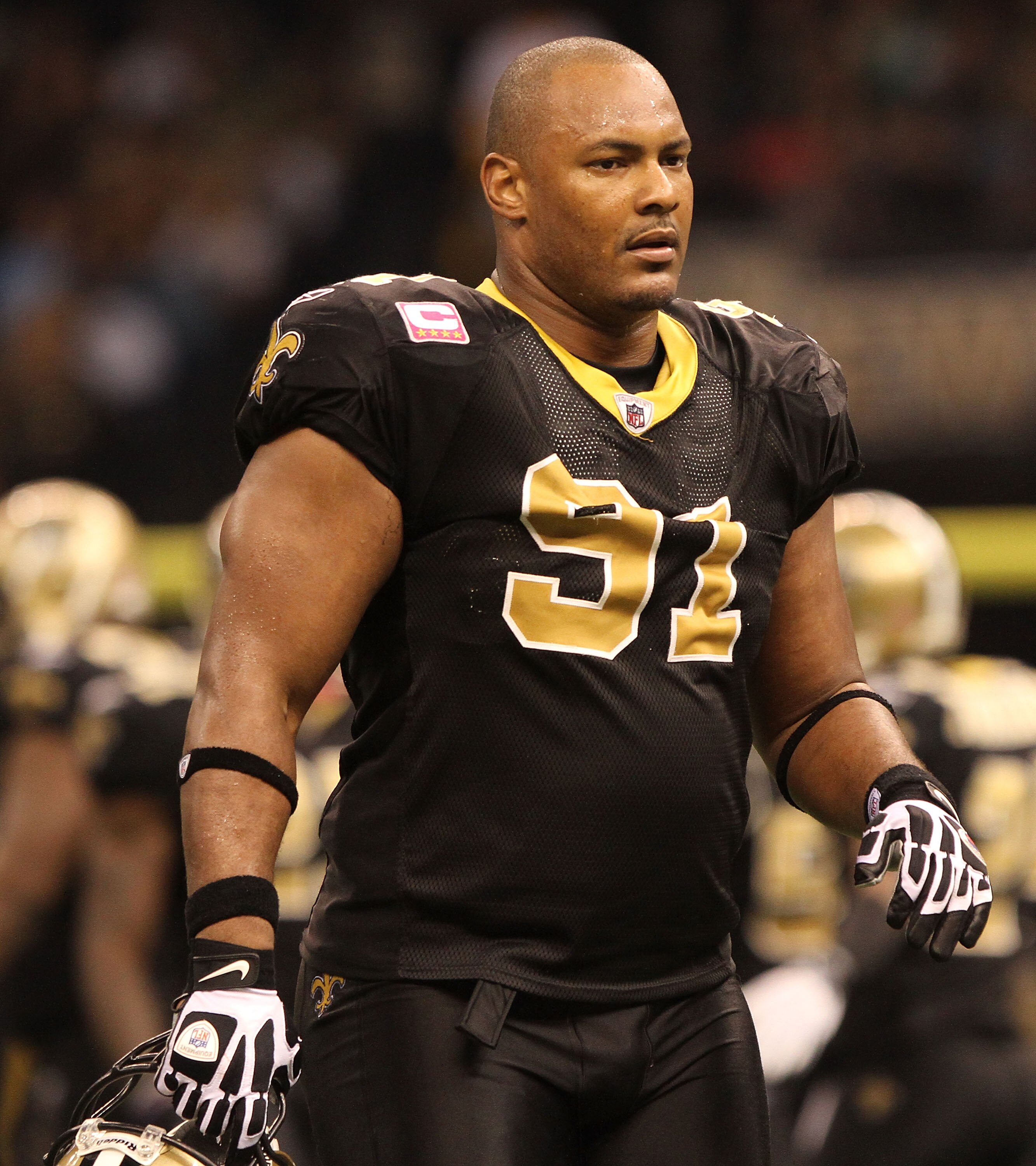 NEW ORLEANS, LA - OCTOBER 31: Will Smith #91 of the New Orleans Saints heads for the sidelines during the game against the Pittsburgh Steelers at the Louisiana Superdome on October 31, 2010 in New Orleans, Louisiana. (Photo by Matthew Sharpe/Getty Images)