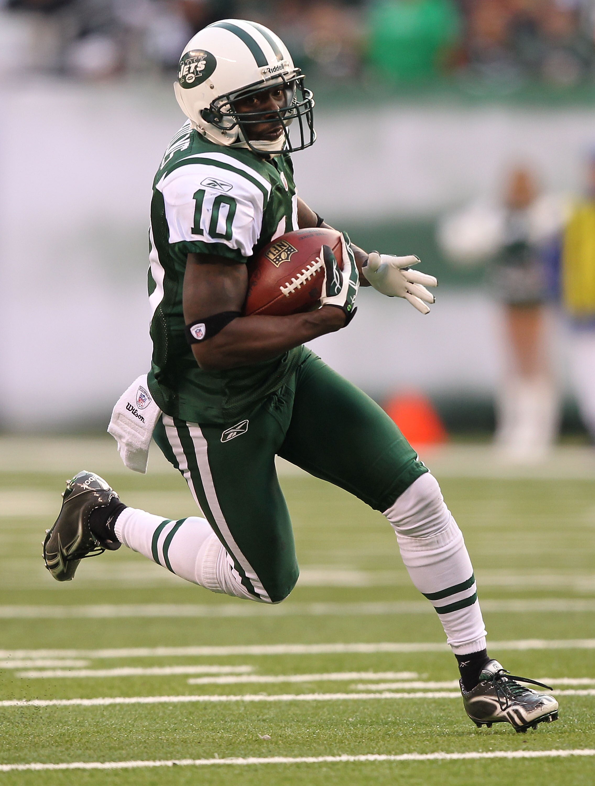 EAST RUTHERFORD, NJ - NOVEMBER 21:  Santonio Holmes #10 of the New York Jets scores a touchdown against the Houston Texans during the third quarter of their  game on November 21, 2010 at the New Meadowlands Stadium in East Rutherford, New Jersey.  (Photo