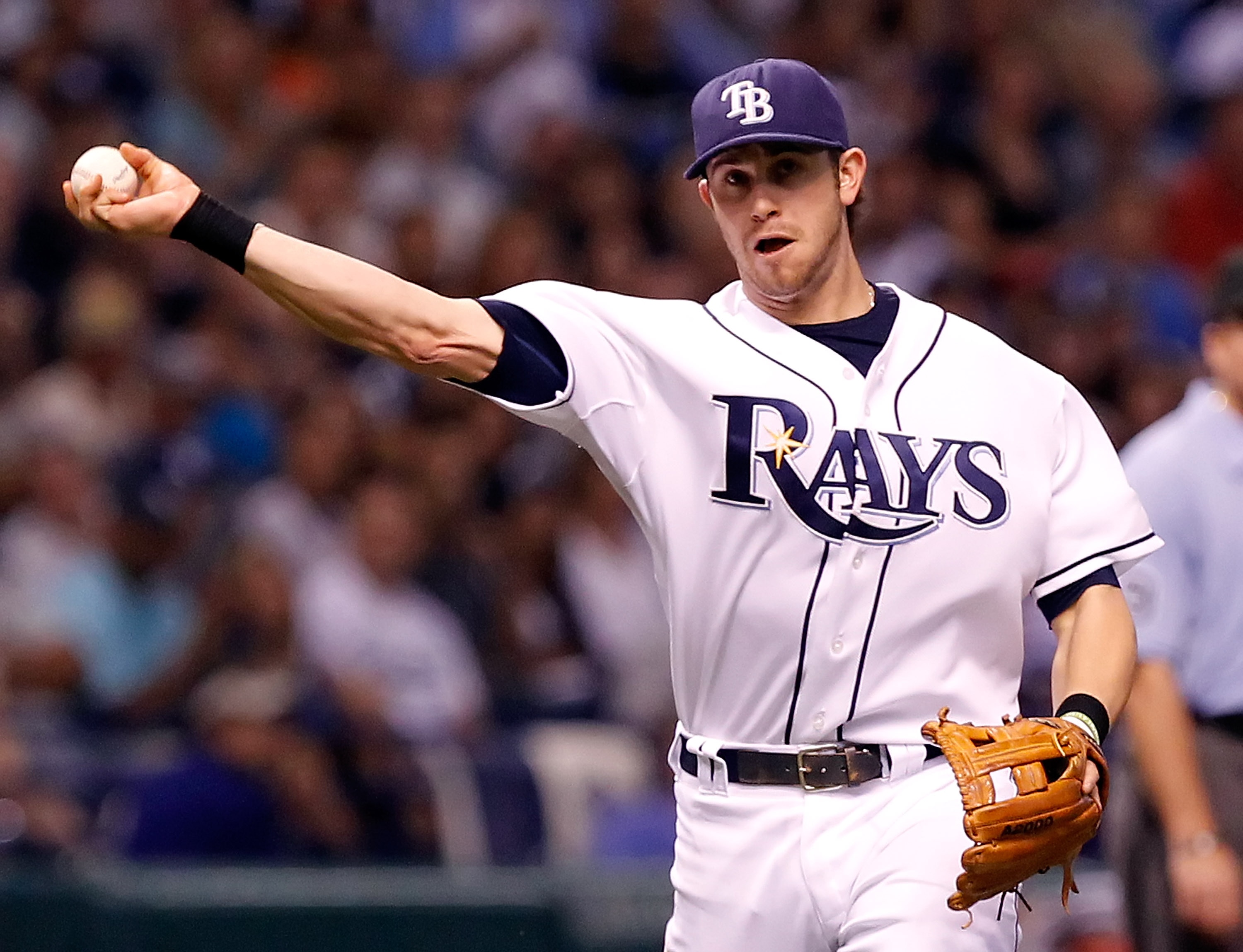 ST. PETERSBURG - SEPTEMBER 13:  Infielder Evan Longoria #3 of the Tampa Bay Rays throws over to first for an out against the New York Yankees during the game at Tropicana Field on September 13, 2010 in St. Petersburg, Florida.  (Photo by J. Meric/Getty Im