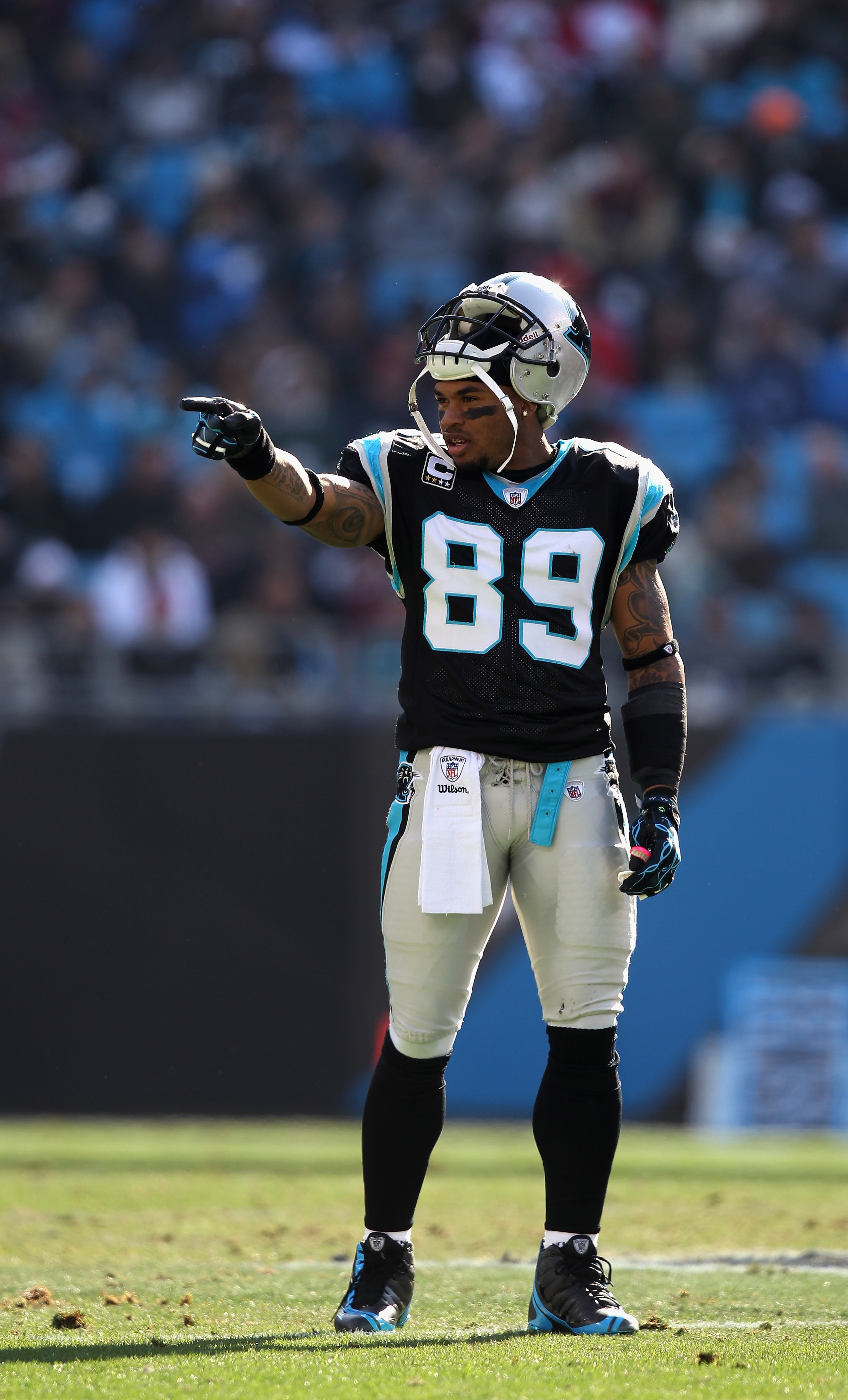 CHARLOTTE, NC - DECEMBER 19:  Steve Smith #89 of the Carolina Panthers points to the Arizona Cardinals sideline during their game at Bank of America Stadium on December 19, 2010 in Charlotte, North Carolina.  (Photo by Streeter Lecka/Getty Images)