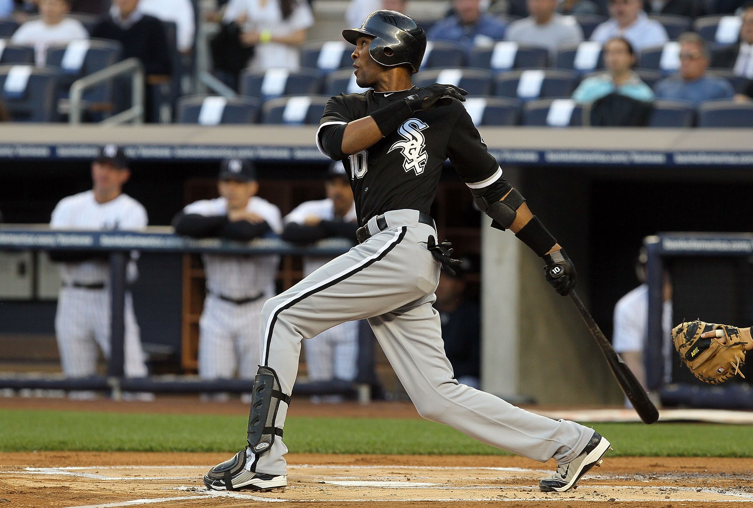 NEW YORK - APRIL 30:  Alexei Ramirez #10 of the Chicago White Sox follows through on a lead off base hit against the New York Yankees on April 30, 2010 at Yankee Stadium in the Bronx borough of New York City.  (Photo by Jim McIsaac/Getty Images)