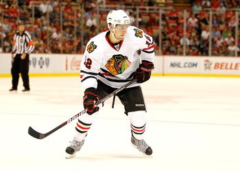 DETROIT - SEPTEMBER 24:  Kyle Beach #12 of the Chicago Blackhawks skates against the Detroit Red Wings during a pre season game on September 24, 2010 at Joe Louis Arena in Detroit, Michigan.  (Photo by Gregory Shamus/Getty Images)