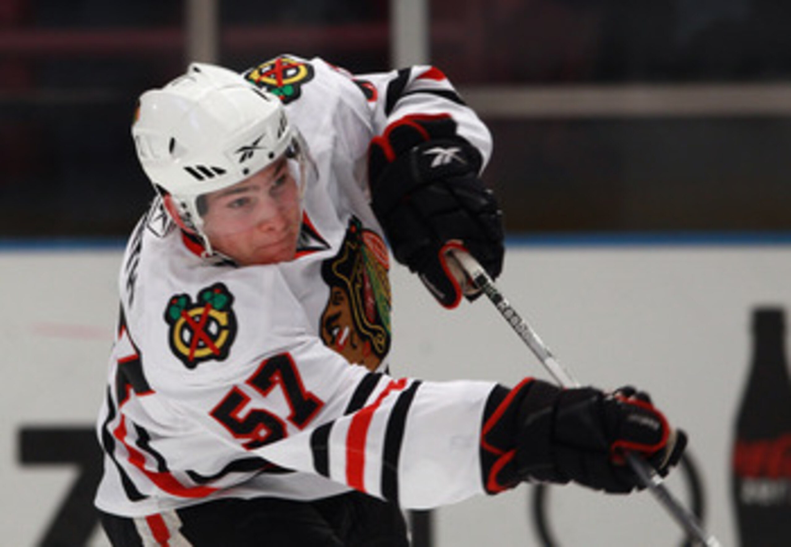 NEW YORK - NOVEMBER 01:  Ben Smith #57 of the Chicago Blackhawks skates against the New York Rangers at Madison Square Garden on November 1, 2010 in New York City. The Rangers defeated the Blackhawks 3-2.  (Photo by Bruce Bennett/Getty Images)