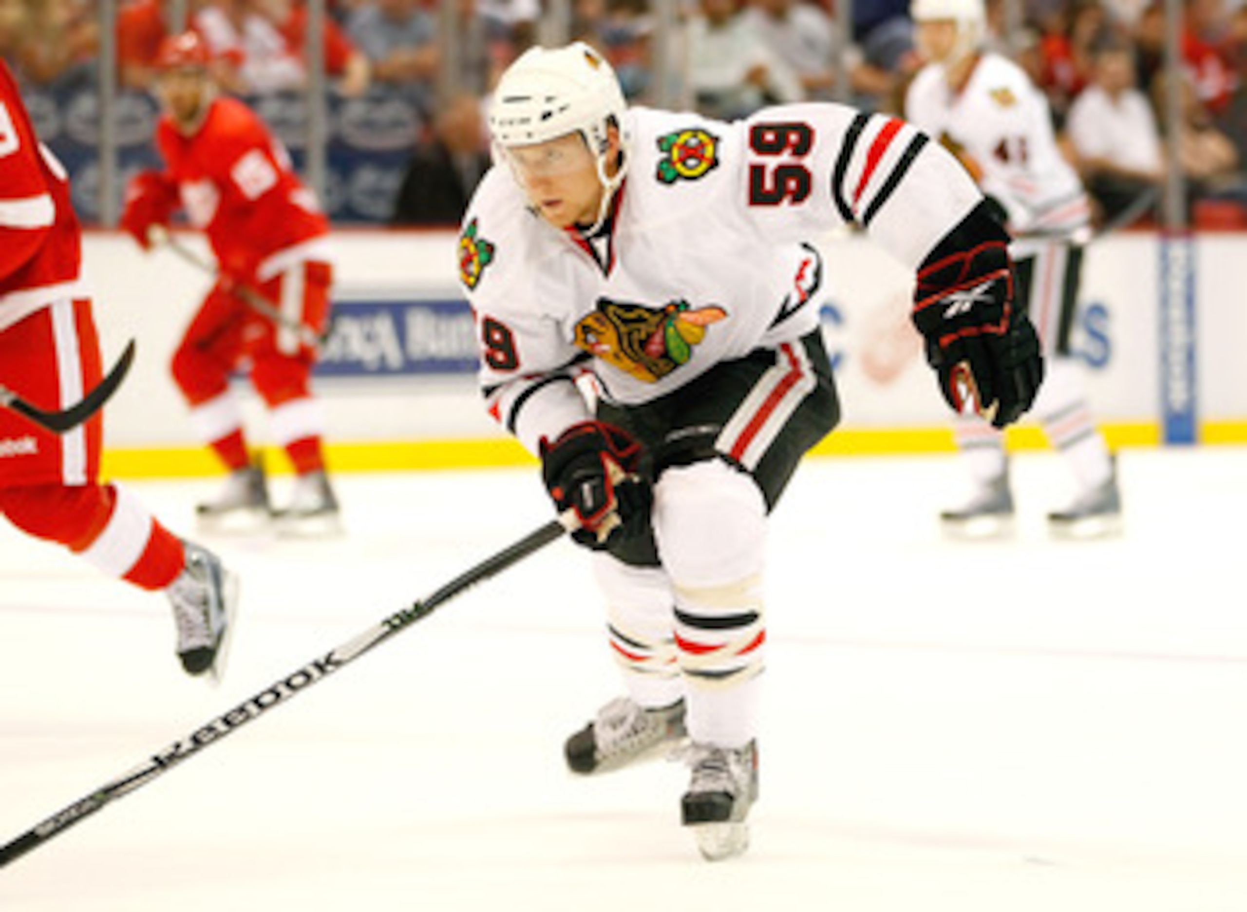 DETROIT - SEPTEMBER 24:  Rob Klinkhammer #59 of the Chicago Blackhawks skates up ice against the Detroit Red Wings during a pre season game on September 24, 2010 at Joe Louis Arena in Detroit, Michigan.  (Photo by Gregory Shamus/Getty Images)