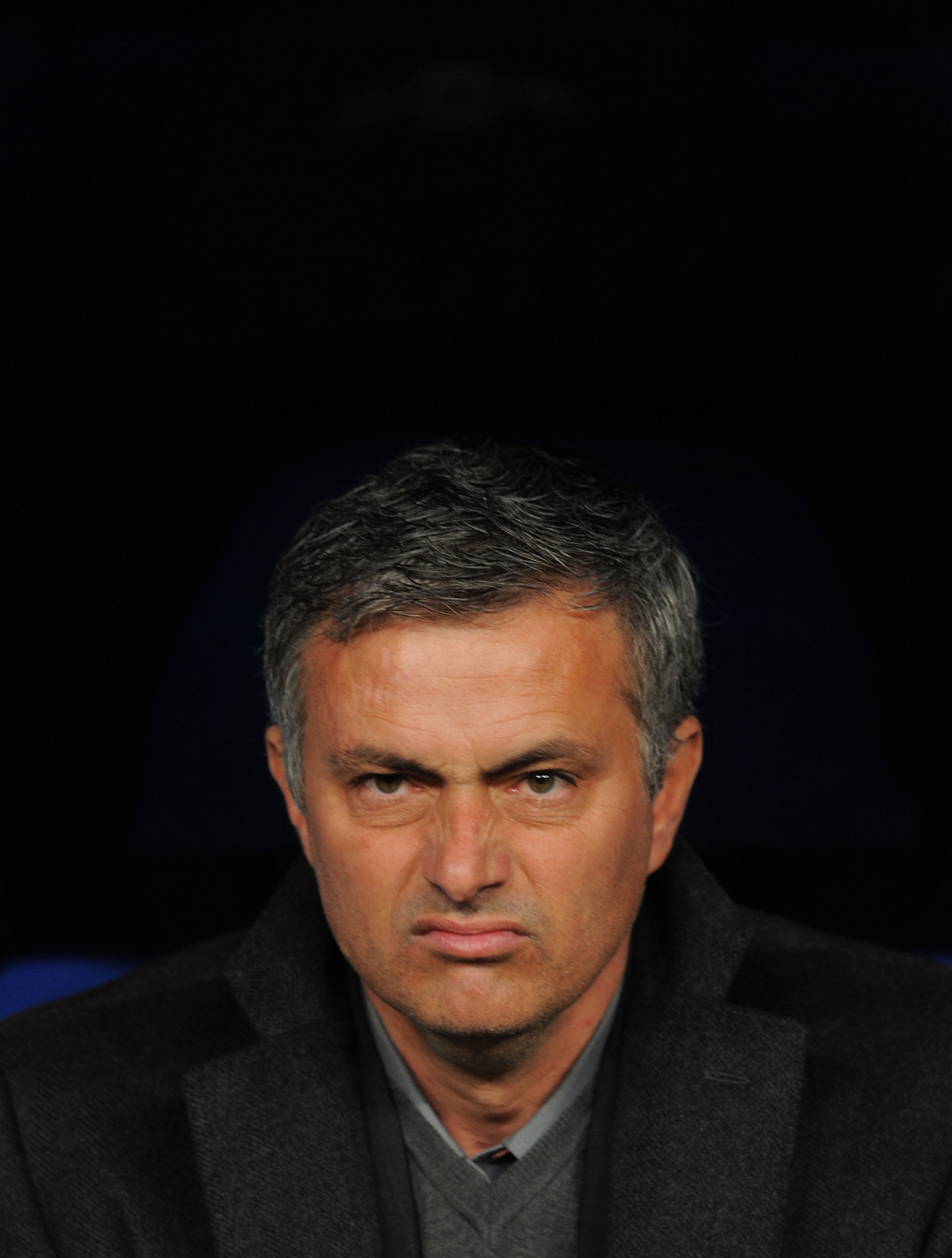 MADRID, SPAIN - MARCH 16:  Head coach Jose Mourinho of Real Madrid looks on before the start of the UEFA Champions League round of 16 second leg match between Real Madrid and Lyon at Estadio Santiago Bernabeu on March 16, 2011 in Madrid, Spain.  (Photo by