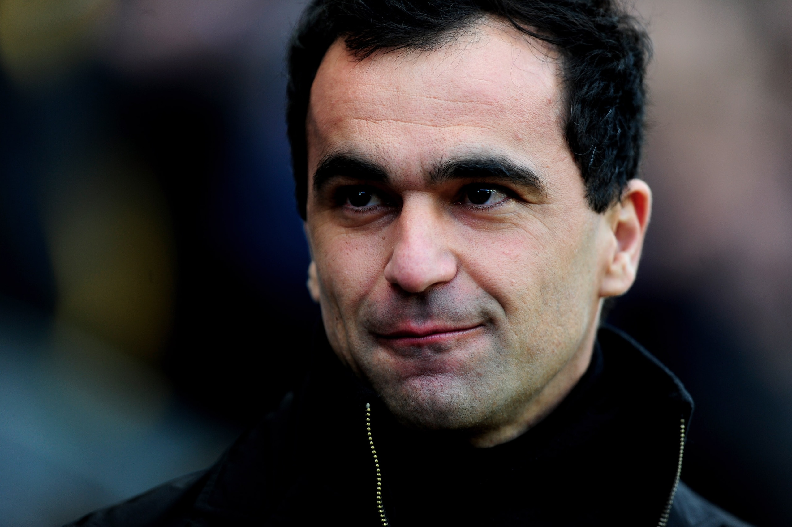 WIGAN, ENGLAND - FEBRUARY 26:  Wigan Athletic Manager Roberto Martinez looks on prior to the Barclays Premier League match between Wigan Athletic and Manchester United at the DW Stadium on February 26, 2011 in Wigan, England.  (Photo by Jamie McDonald/Get