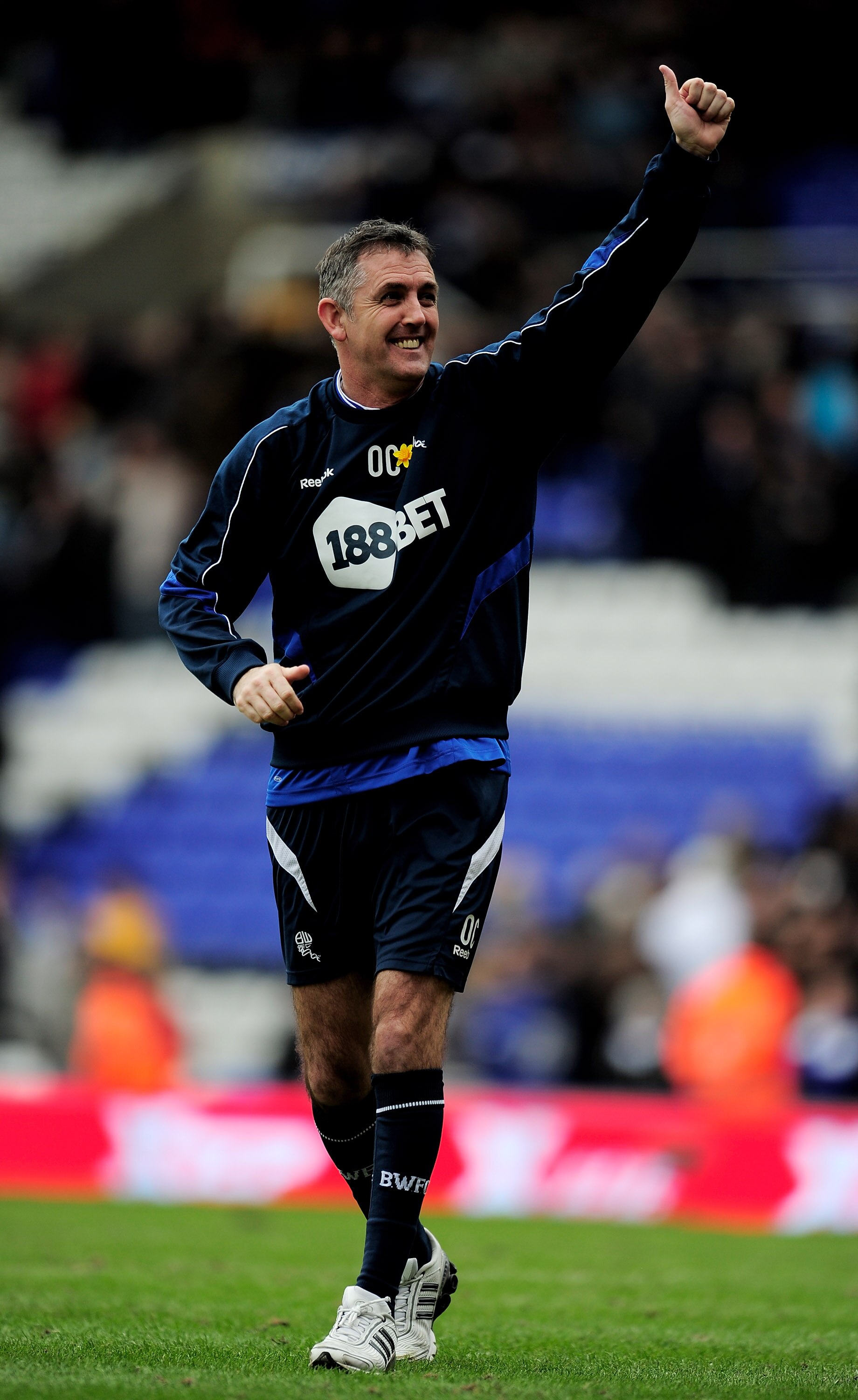 BIRMINGHAM, ENGLAND - MARCH 12: Manager Owen Coyle of Bolton Wanderers celebrates at the final whistle during the FA Cup sponsored by E.On Sixth Round match between Birmingham City and Bolton Wanderers at St Andrews on March 12, 2011 in Birmingham, Englan