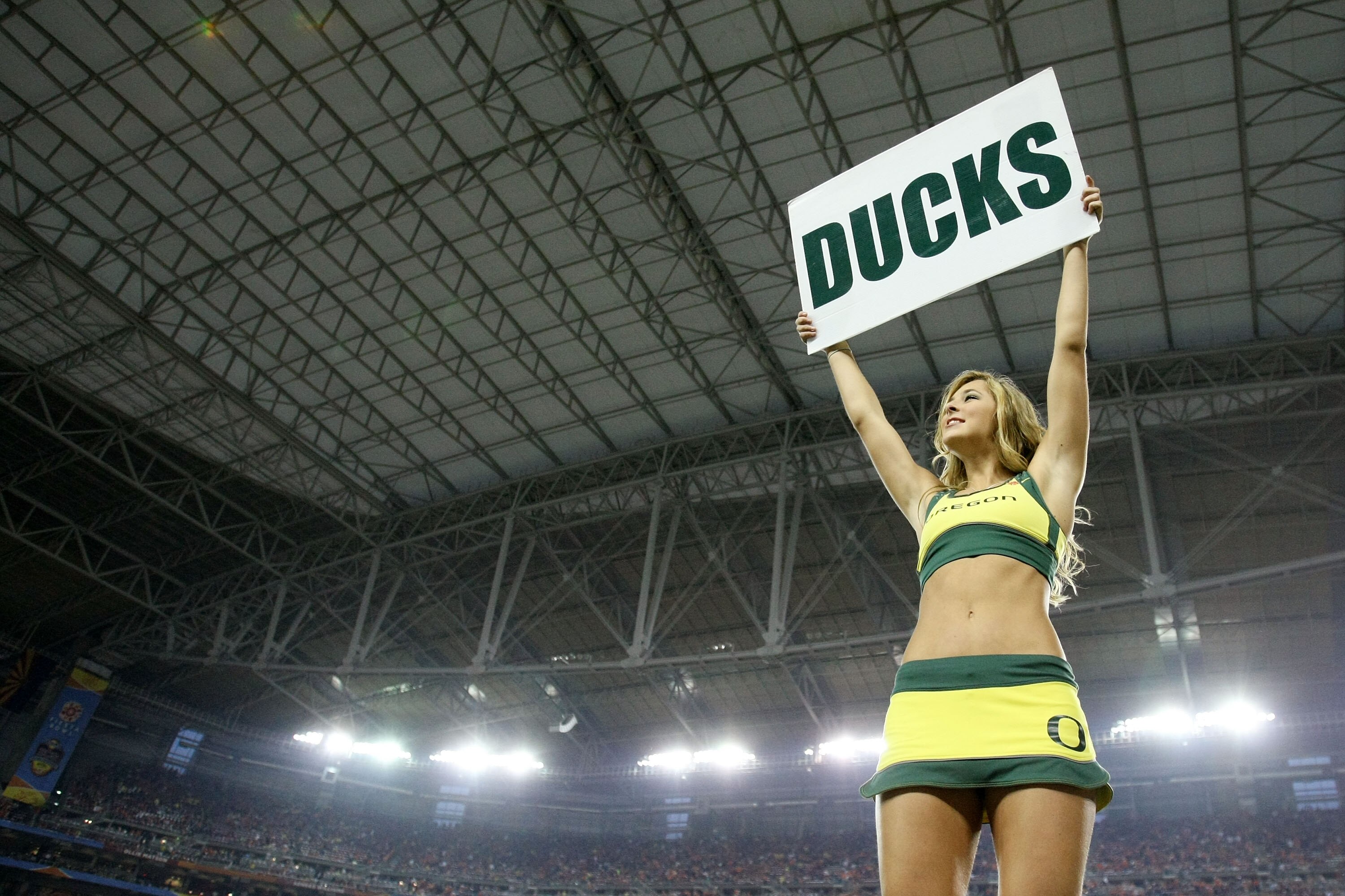 GLENDALE, AZ - JANUARY 10: An Oregon Ducks cheerleader performs before taking on the Auburn Tigers in the Tostitos BCS National Championship Game at University of Phoenix Stadium on January 10, 2011 in Glendale, Arizona. (Photo by Jonathan Ferrey/Getty Im