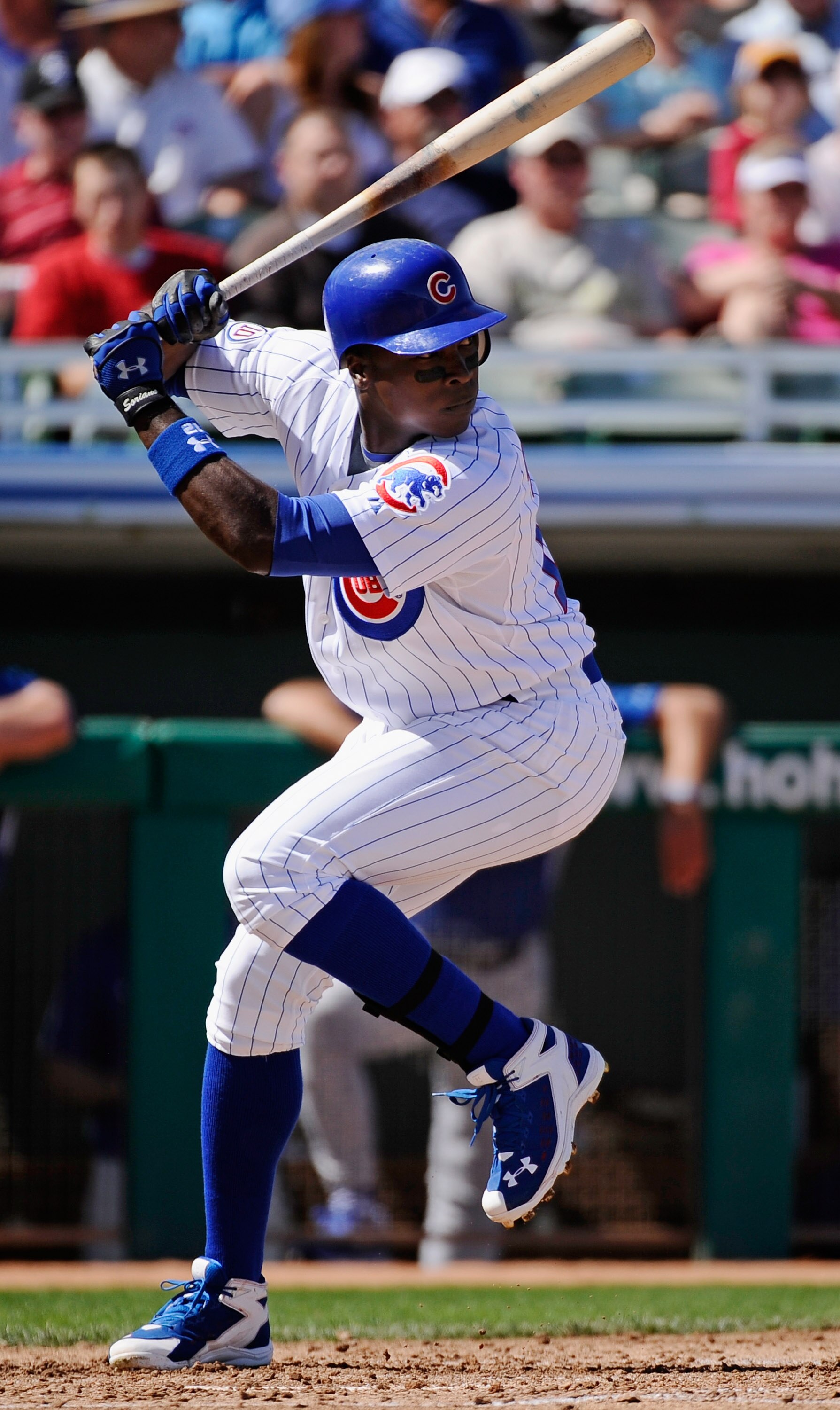 MESA, AZ - MARCH 09:  Alfonso Soriano #12 of the Chicago Cubs swings at a pitch against the Kansas City Royals during the spring training baseball game at HoHoKam Stadium on March 9, 2011 in Mesa, Arizona.  (Photo by Kevork Djansezian/Getty Images)