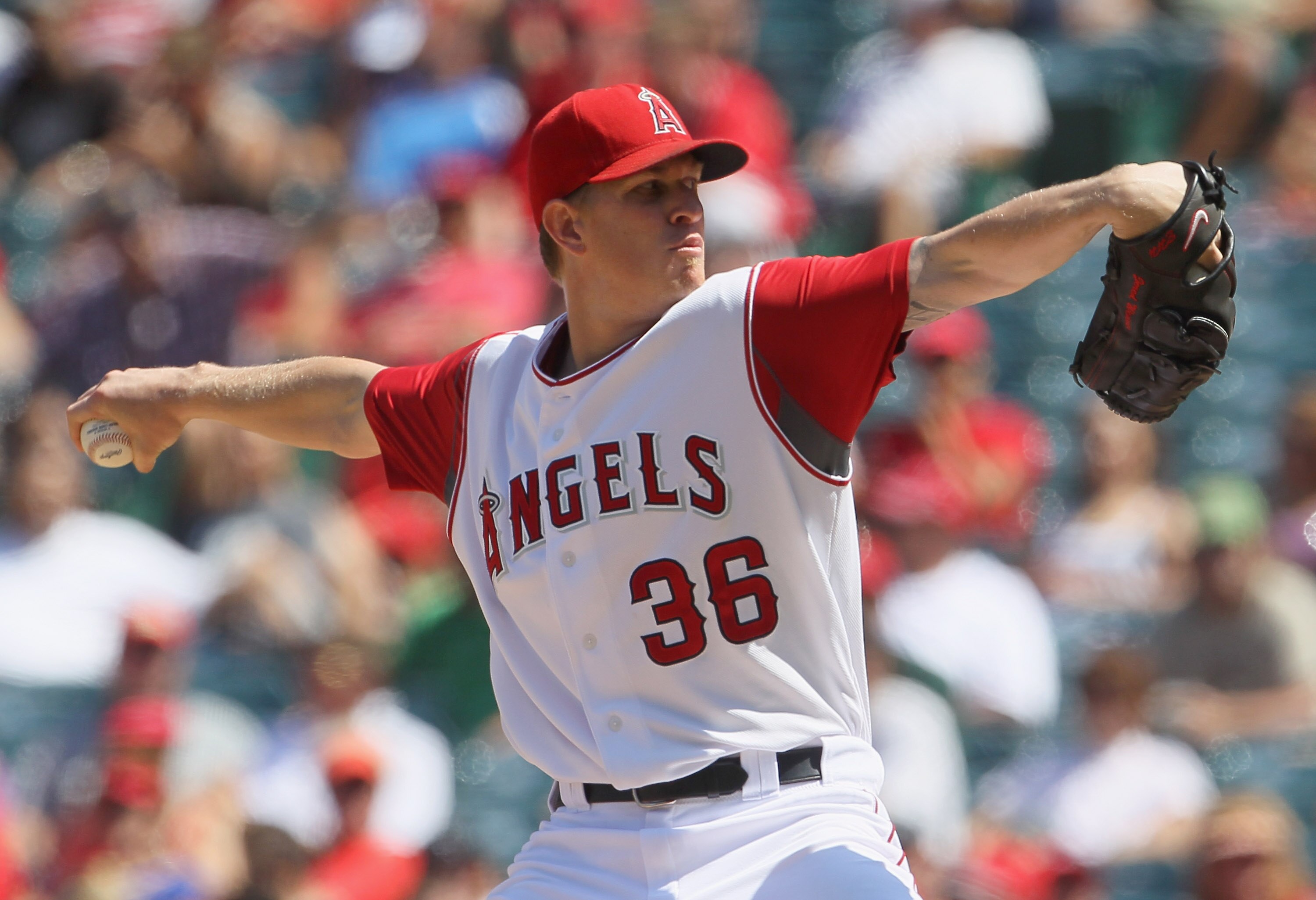 ANAHEIM, CA - AUGUST 11:  Jered Weaver #36 of the Los Angeles Angels of Anaheim pitches against the Kansas City Royals in the seventh inning at Angel Stadium on August 11, 2010 in Anaheim, California.  The Angels defeated the Royals 2-1 in ten innings.(Ph