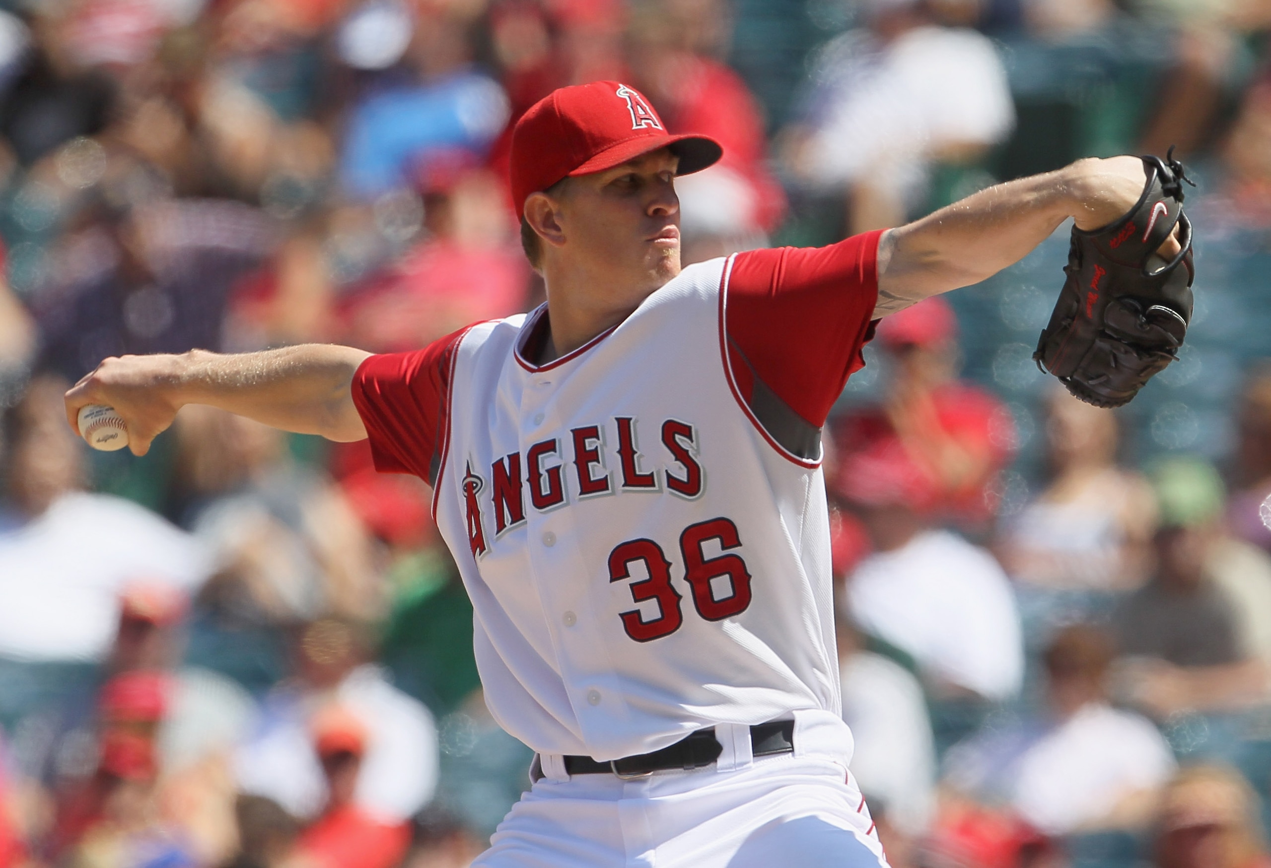 ANAHEIM, CA - AUGUST 11: Jered Weaver #36 of the Los Angeles Angels of Anaheim pitches against the Kansas City Royals in the seventh inning at Angel Stadium on August 11, 2010 in Anaheim, California. The Angels defeated the Royals 2-1 in ten innings.(Ph ANAHEIM, CA - AUGUST 11: Jered Weaver #36 of the Los Angeles Angels of Anaheim pitches against the Kansas City Royals in the seventh inning at Angel Stadium on August 11, 2010 in Anaheim, California. The Angels defeated the Royals 2-1 in ten innings.(Ph