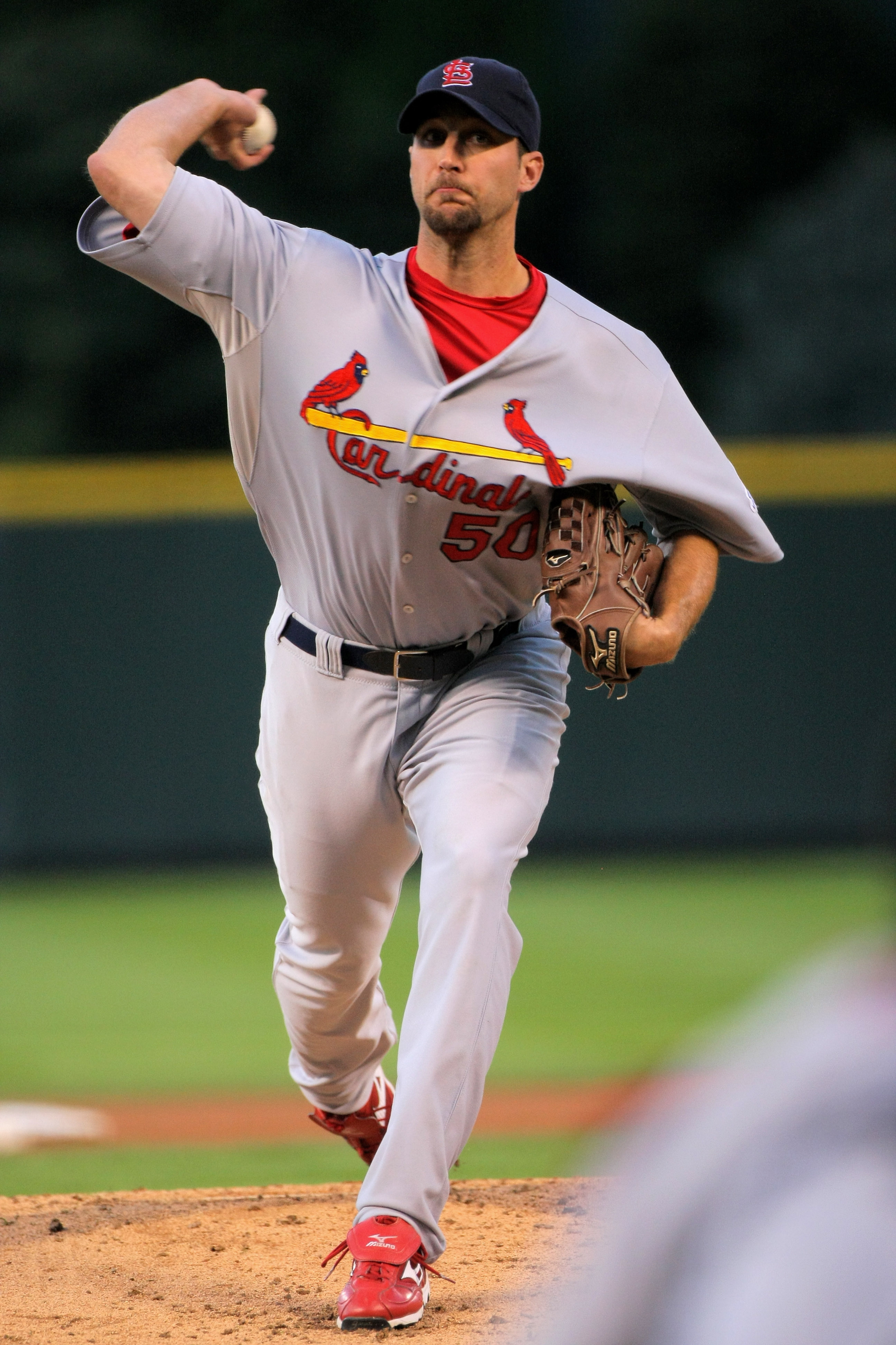DENVER - SEPTEMBER 26:  Starting pitcher Adam Wainright #50 of the St. Louis Cardinals delivers against the Colorado Rockies at Coors Field on September 26, 2009 in Denver, Colorado.  (Photo by Doug Pensinger/Getty Images)