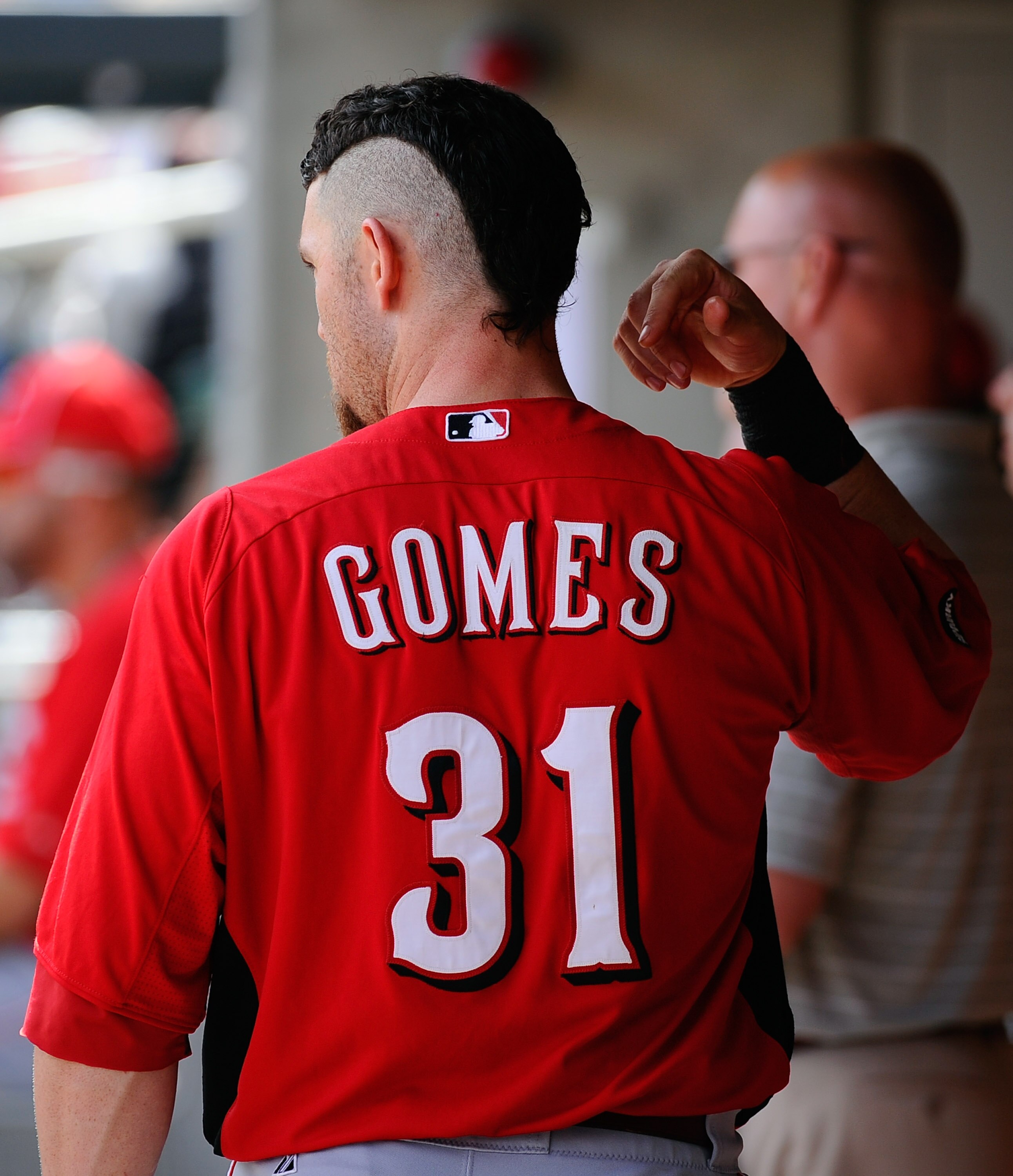 SCOTTSDALE, AZ - MARCH 14:  Johnny Gomes #31 of the Cincinnati Reds against the Colorodo Rockies during the spring training baseball game at Salt River Fields at Talking Stick on March 14, 2011 in Scottsdale, Arizona.  (Photo by Kevork Djansezian/Getty Im
