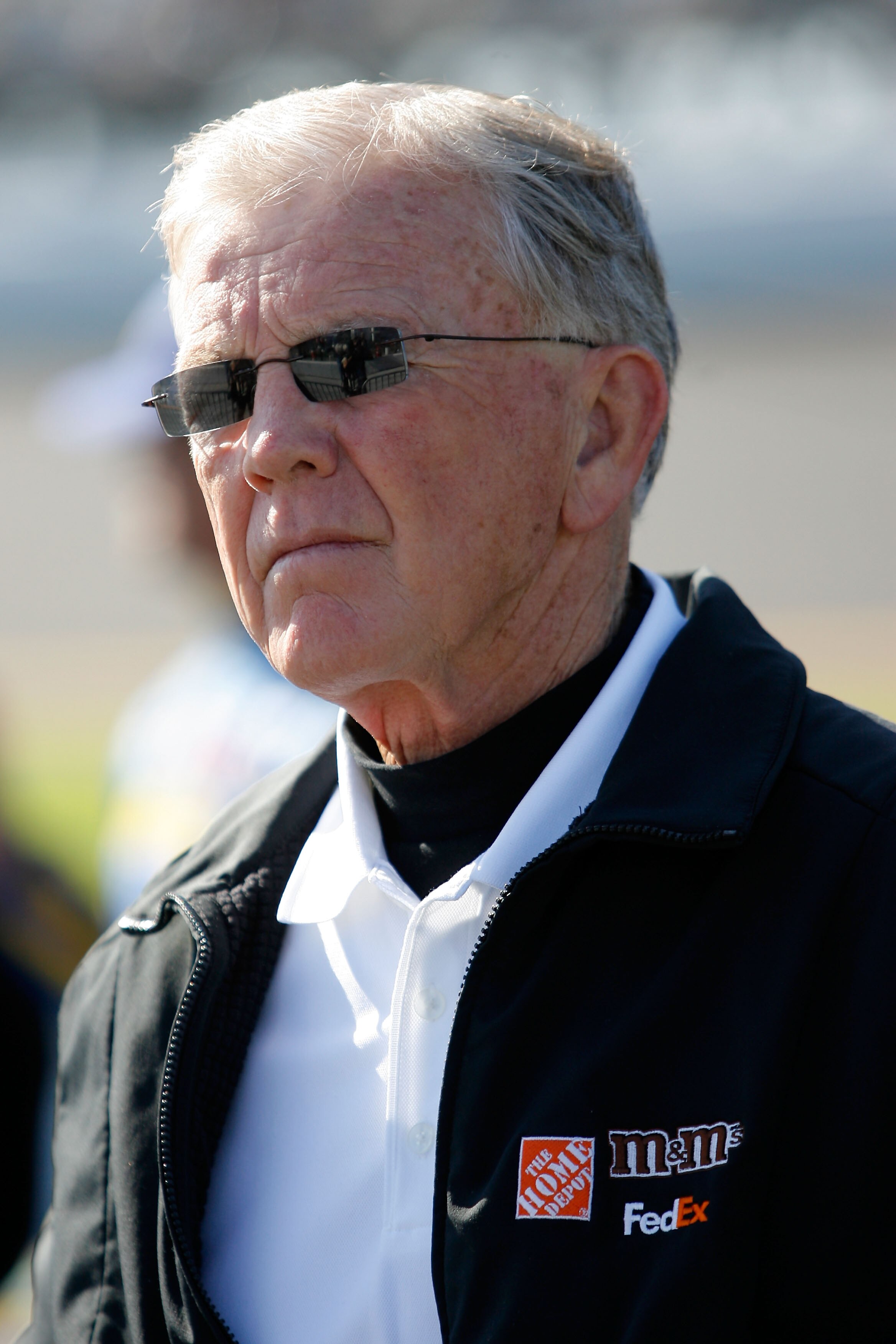 DAYTONA BEACH, FL - FEBRUARY 13:  Team owner Joe Gibbs stands on the grid during qualifying for the NASCAR Sprint Cup Series Daytona 500 at Daytona International Speedway on February 13, 2011 in Daytona Beach, Florida.  (Photo by Tom Pennington/Getty Imag