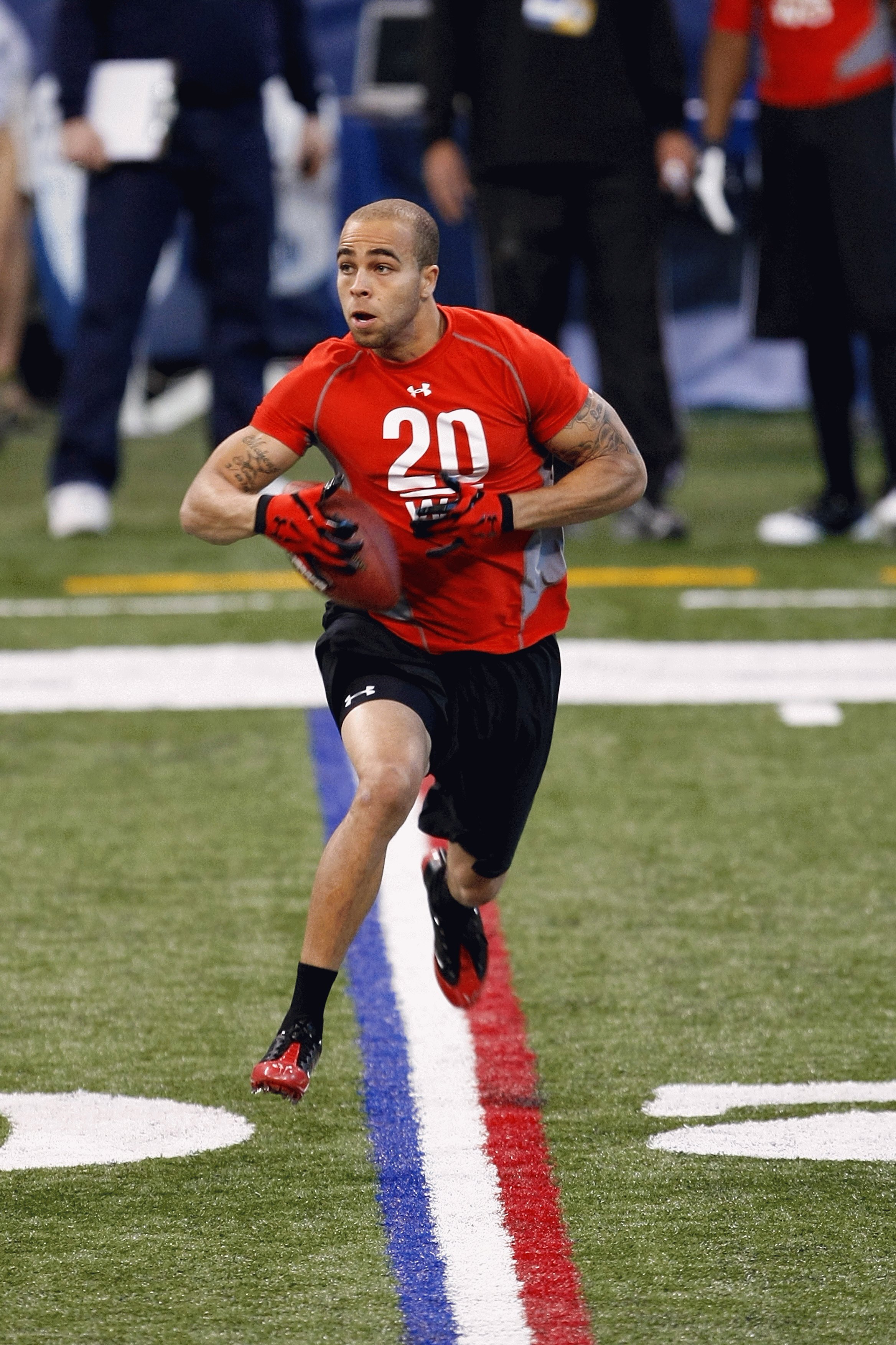 INDIANAPOLIS, IN - FEBRUARY 22:  Wide receiver Johnny Knox of Abilene Christian catches the football during the NFL Scouting Combine presented by Under Armour at Lucas Oil Stadium on February 22, 2009 in Indianapolis, Indiana. (Photo by Scott Boehm/Getty 