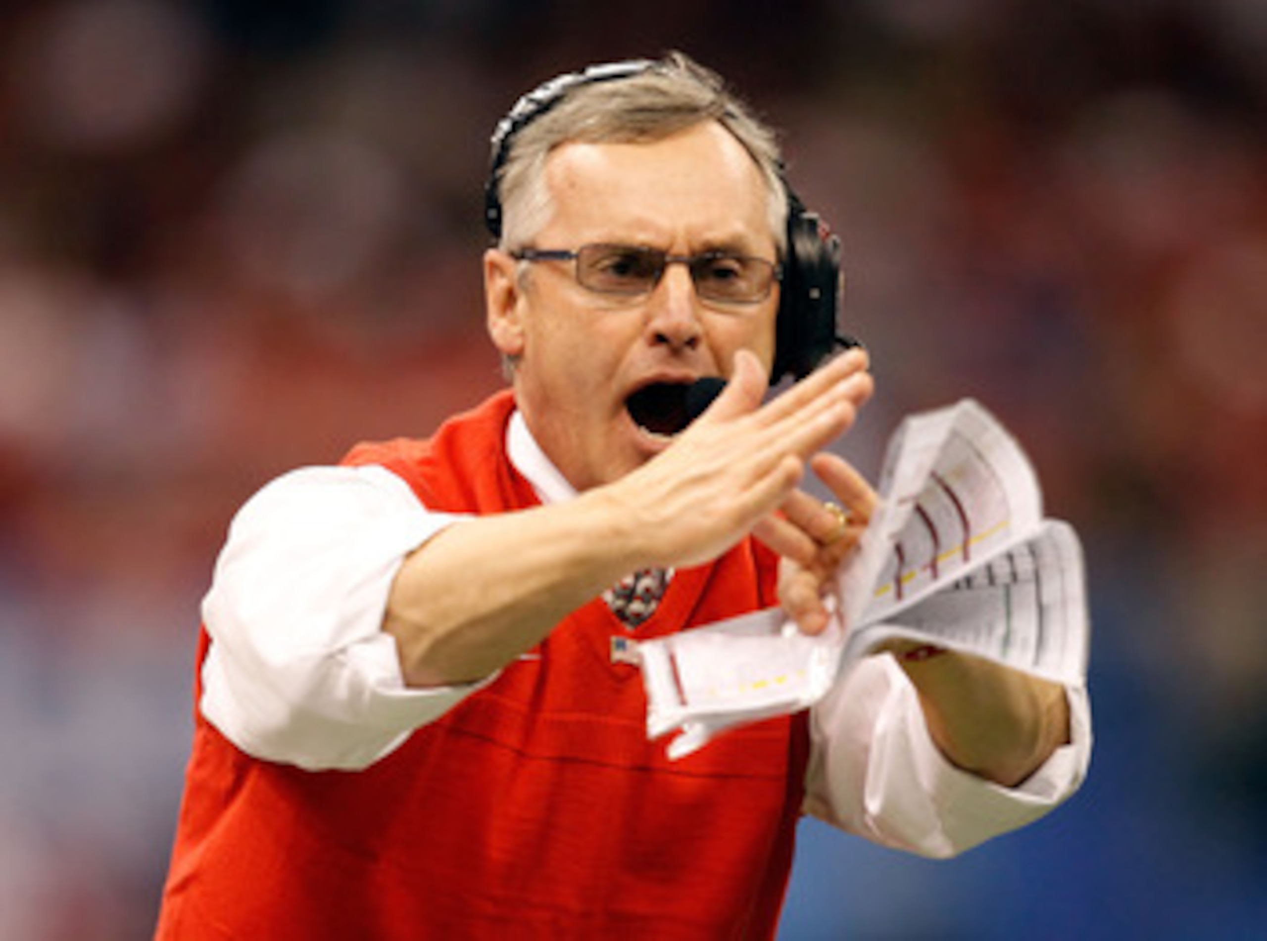 NEW ORLEANS, LA - JANUARY 04:  Head coach Jim Tressel of the Ohio State Buckeyes calls a time out in the first half against the Arkansas Razorbacks during the Allstate Sugar Bowl at the Louisiana Superdome on January 4, 2011 in New Orleans, Louisiana.  (P