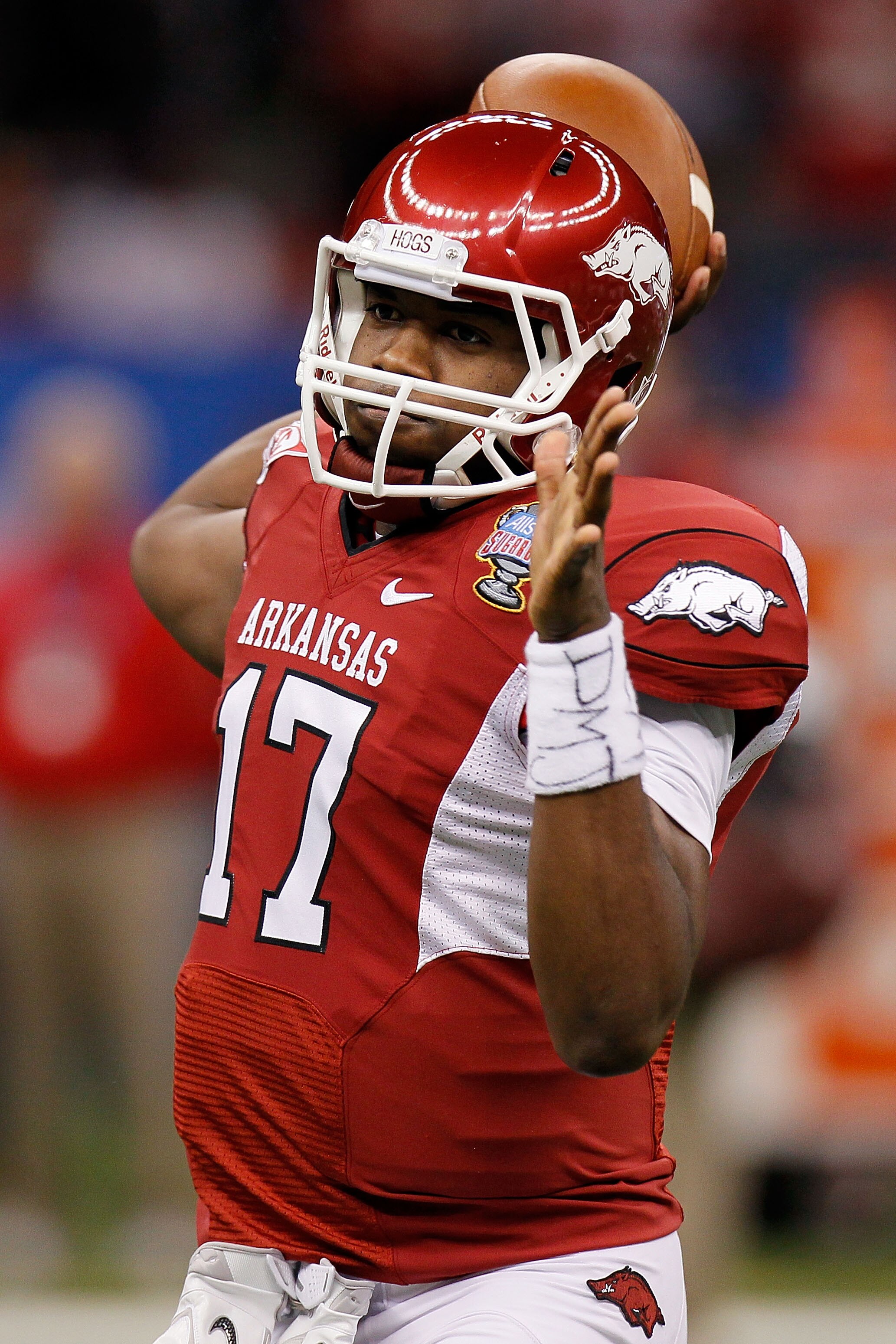 NEW ORLEANS, LA - JANUARY 04:  Brandon Mitchell #17 of the Arkansas Razorbacks warms up before taking on the Ohio State Buckeyes during the Allstate Sugar Bowl at the Louisiana Superdome on January 4, 2011 in New Orleans, Louisiana.  (Photo by Kevin C. Co