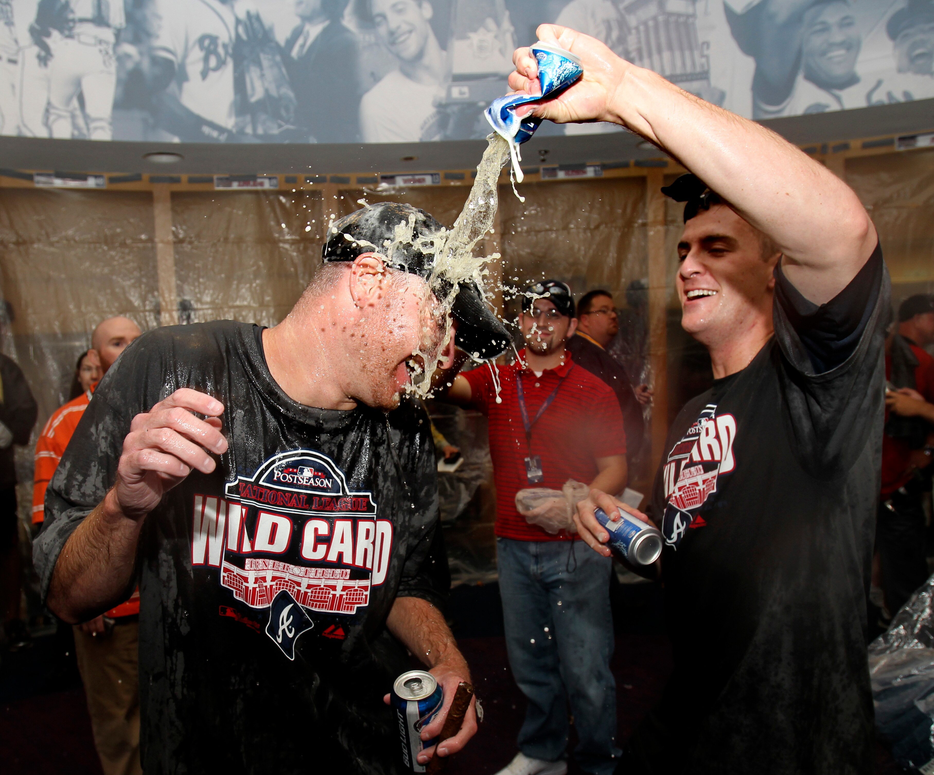 ATLANTA - OCTOBER 03:  Pitcher Jonny Venters #39 of the Atlanta Braves (left) celebrates with teammate Eric O'Flaherty #34 after the Braves clinch the National League Wildcard after the game against the Philadelphia Phillies at Turner Field on October 3,