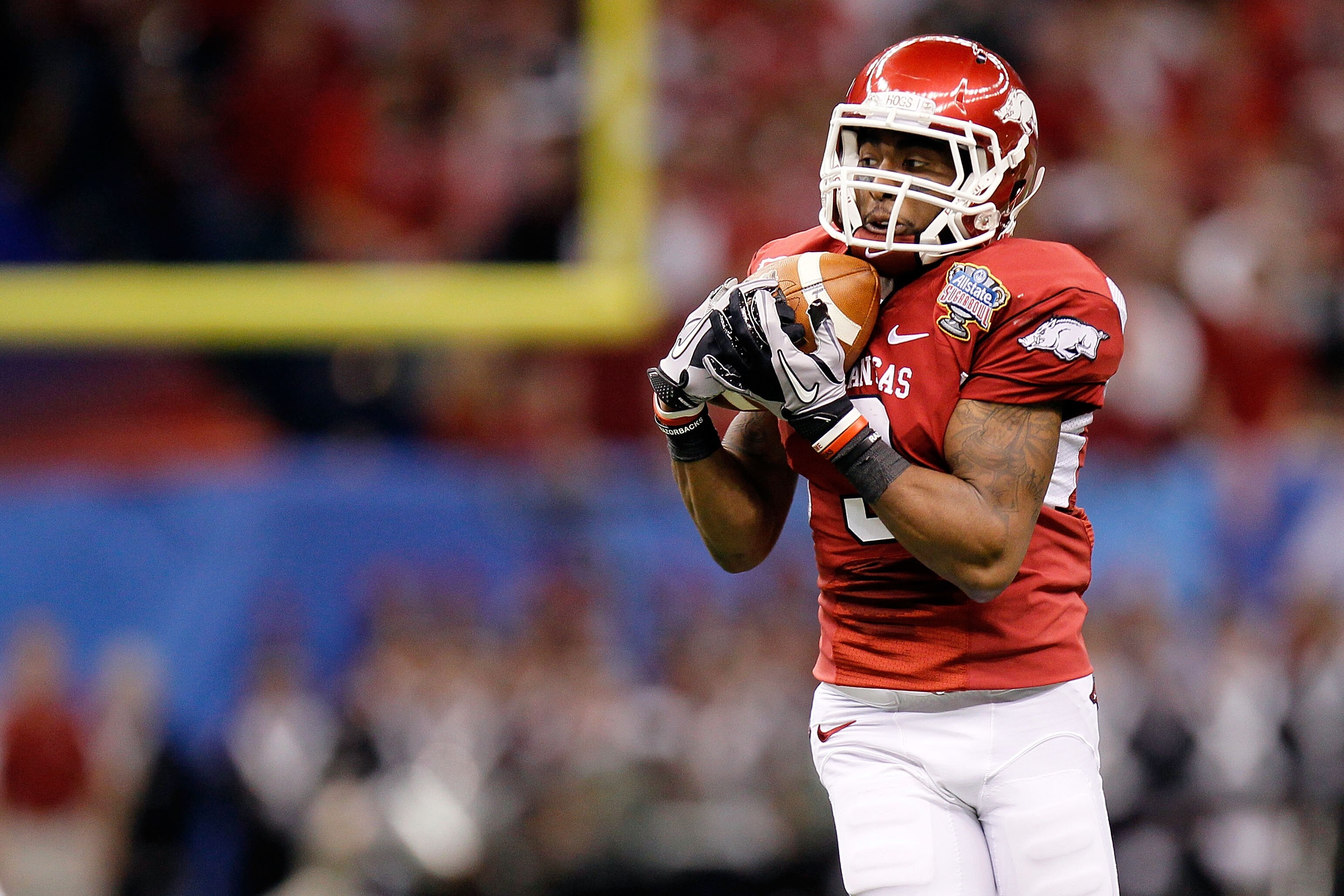 NEW ORLEANS, LA - JANUARY 04: Joe Adams #3 of the Arkansas Razorbacks catches a pass against the Ohio State Buckeyes during the Allstate Sugar Bowl at the Louisiana Superdome on January 4, 2011 in New Orleans, Louisiana. (Photo by Kevin C. Cox/Getty Ima NEW ORLEANS, LA - JANUARY 04: Joe Adams #3 of the Arkansas Razorbacks catches a pass against the Ohio State Buckeyes during the Allstate Sugar Bowl at the Louisiana Superdome on January 4, 2011 in New Orleans, Louisiana. (Photo by Kevin C. Cox/Getty Ima