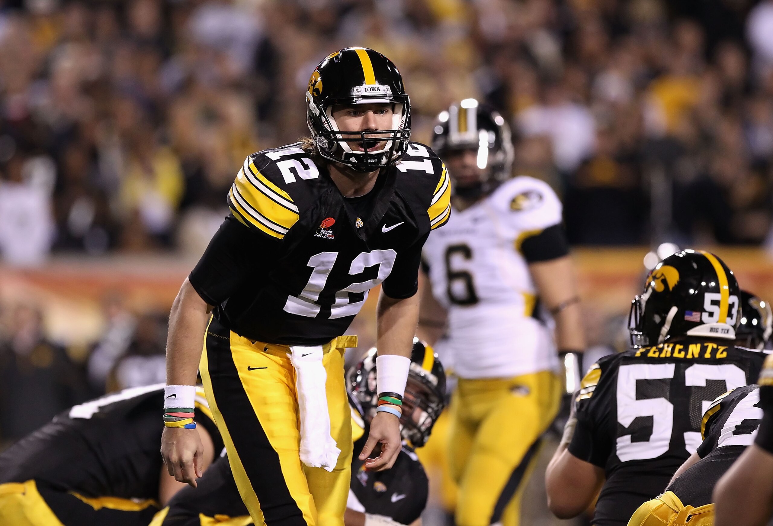TEMPE, AZ - DECEMBER 28: Quarterback Ricky Stanzi #12 of the Iowa Hawkeyes during the Insight Bowl against the Missouri Tigers at Sun Devil Stadium on December 28, 2010 in Tempe, Arizona. The Hawkeyes defeated the Tigers 27-24. (Photo by Christian Peter TEMPE, AZ - DECEMBER 28: Quarterback Ricky Stanzi #12 of the Iowa Hawkeyes during the Insight Bowl against the Missouri Tigers at Sun Devil Stadium on December 28, 2010 in Tempe, Arizona. The Hawkeyes defeated the Tigers 27-24. (Photo by Christian Peter