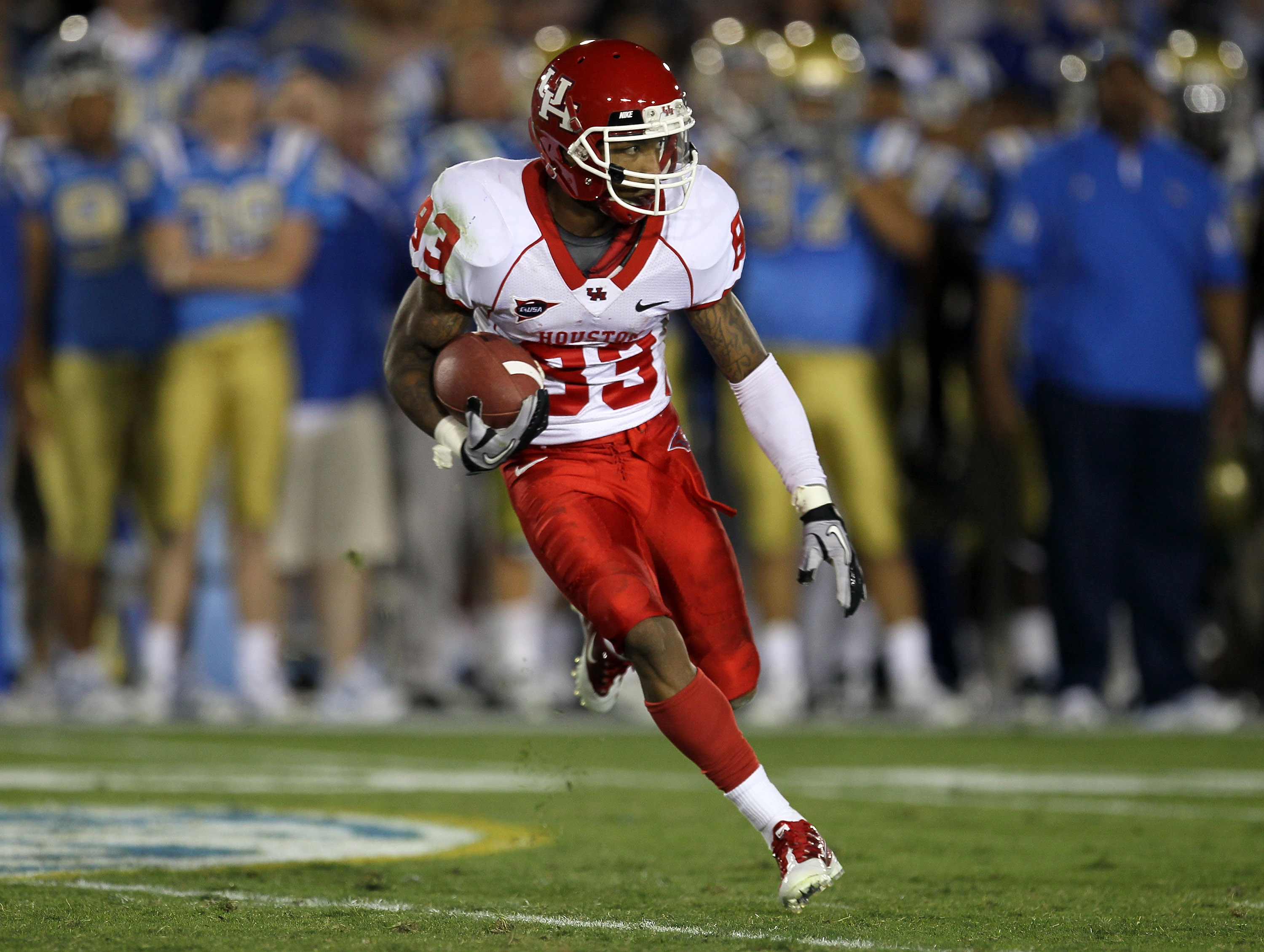 PASADENA, CA - SEPTEMBER 18: Wide receiver Patrick Edwards #83 of the Houston Cougars carries the ball against the UCLA Bruins at the Rose Bowl on September 18, 2010 in Pasadena, California. UCLA won 31-13. (Photo by Stephen Dunn/Getty Images) PASADENA, CA - SEPTEMBER 18: Wide receiver Patrick Edwards #83 of the Houston Cougars carries the ball against the UCLA Bruins at the Rose Bowl on September 18, 2010 in Pasadena, California. UCLA won 31-13. (Photo by Stephen Dunn/Getty Images)