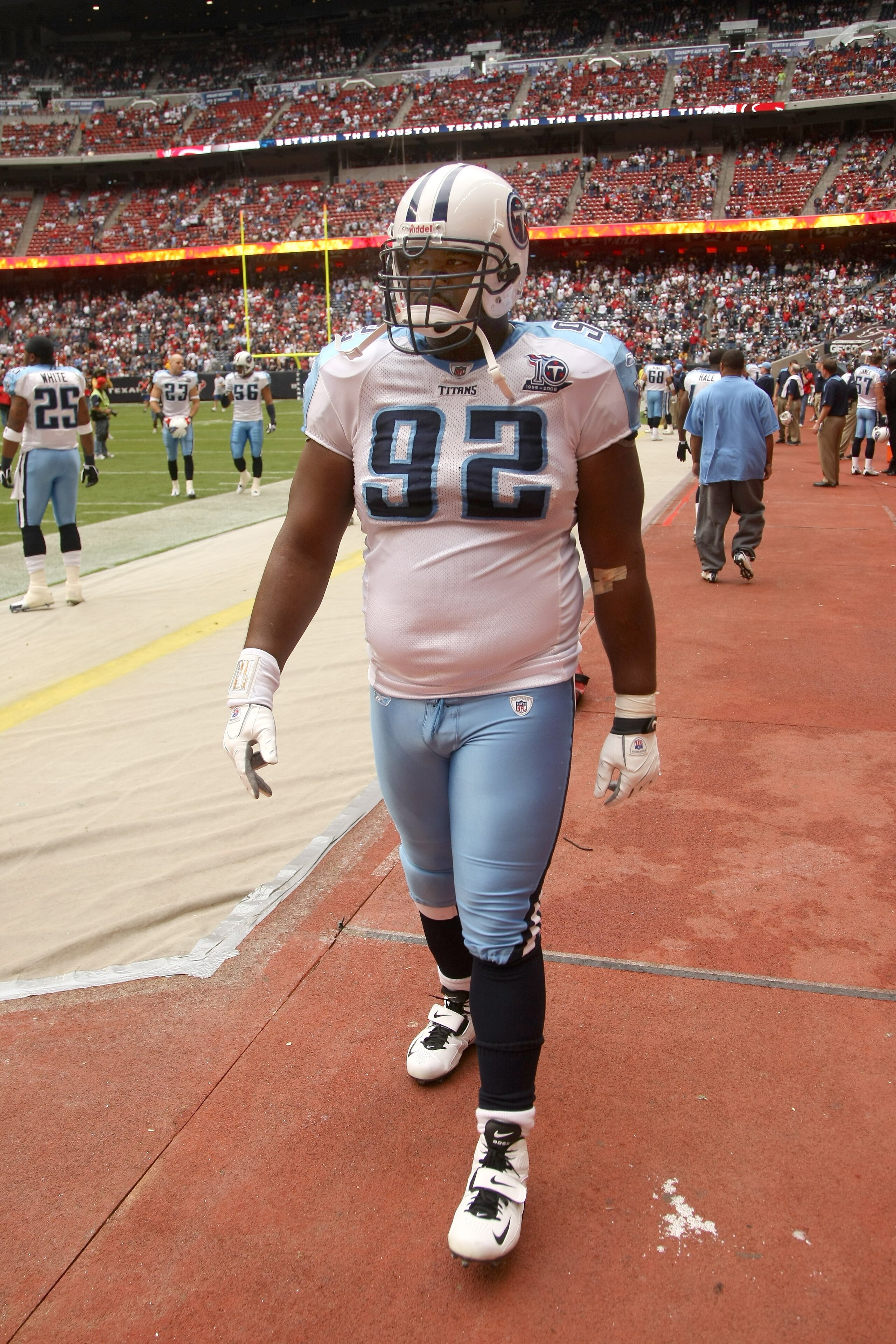 HOUSTON - DECEMBER 14:  Defensive tackle Albert Haynesworth #92 of the Tennessee Titans paces by the bench before the game with the Houston Texans on December 14, 2008 at Reliant Stadium in Houston, Texas.  The Texans won 13-12.  (Photo by Stephen Dunn/Ge