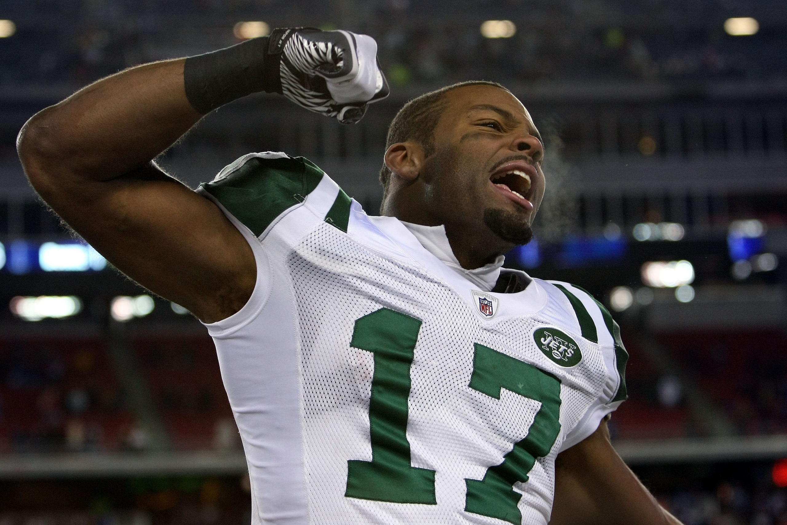 FOXBORO, MA - JANUARY 16:  Braylon Edwards #17 of the New York Jets celebrates on his way to defeating the Patriots 28 to 21 in their 2011 AFC divisional playoff game at Gillette Stadium on January 16, 2011 in Foxboro, Massachusetts.  (Photo by Michael He