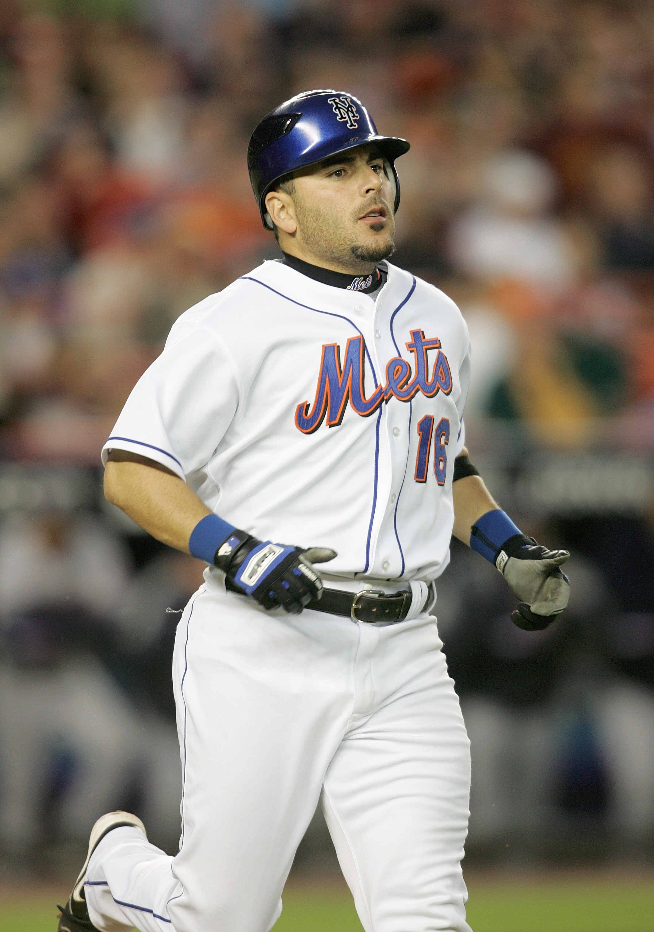FLUSHING, NY - MAY 1:  Paul Lo Duca #16 of the New York Mets runs during the game against the Washington Nationals on May 1, 2006 at Shea Stadium in the Flushing, neighborhood of the Queens borough of New York City. (Photo by Nick Laham/Getty Images)