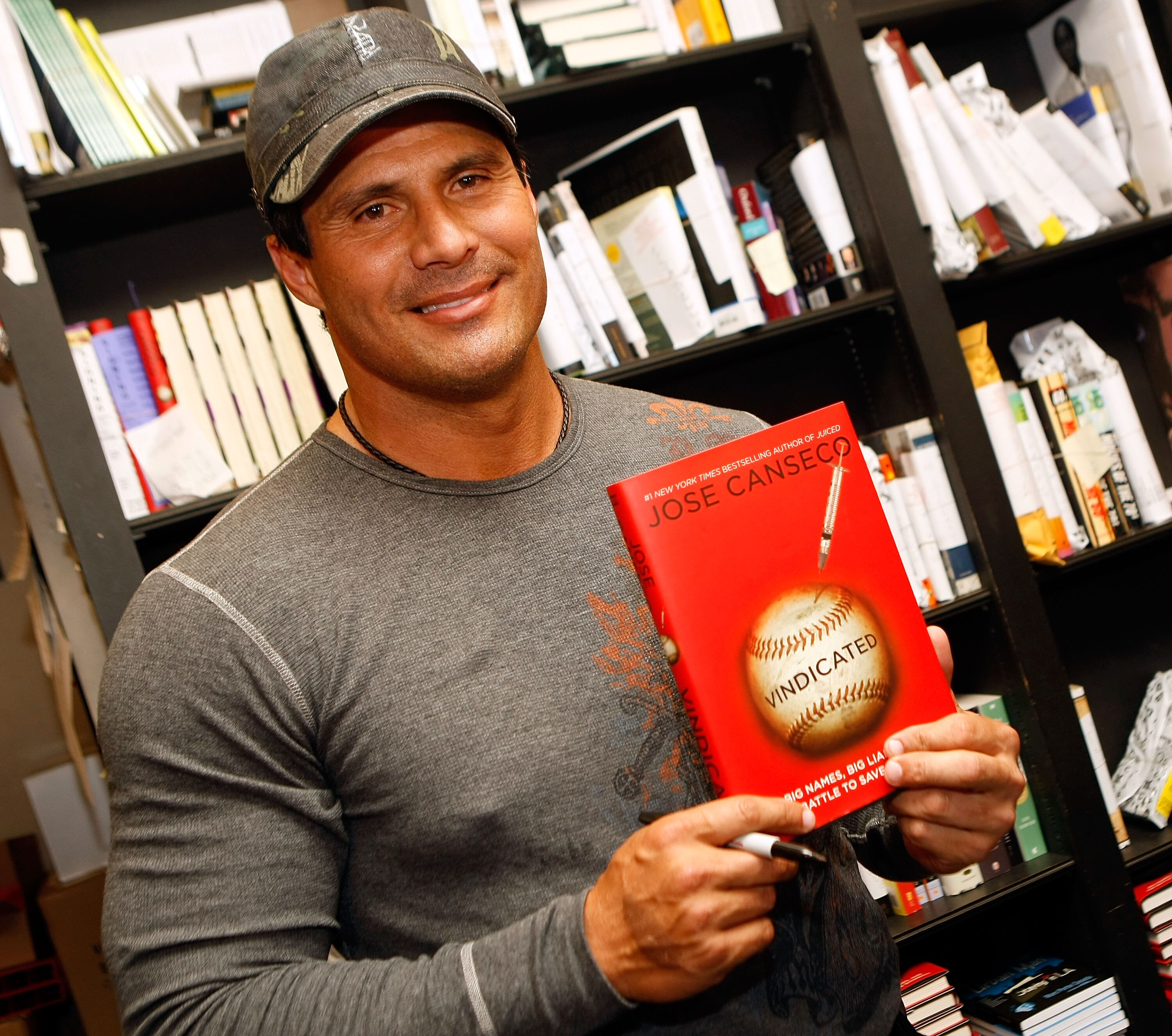LOS ANGELES, CA - APRIL 07:  Former baseball player and author Jose Canseco  signs copies of his new book 'Vindicated: Big Names, Big Liars, and the Battle to Save Baseball' at Book Soup on April 7, 2008 in Los Angeles, California.  (Photo by Michael Buck