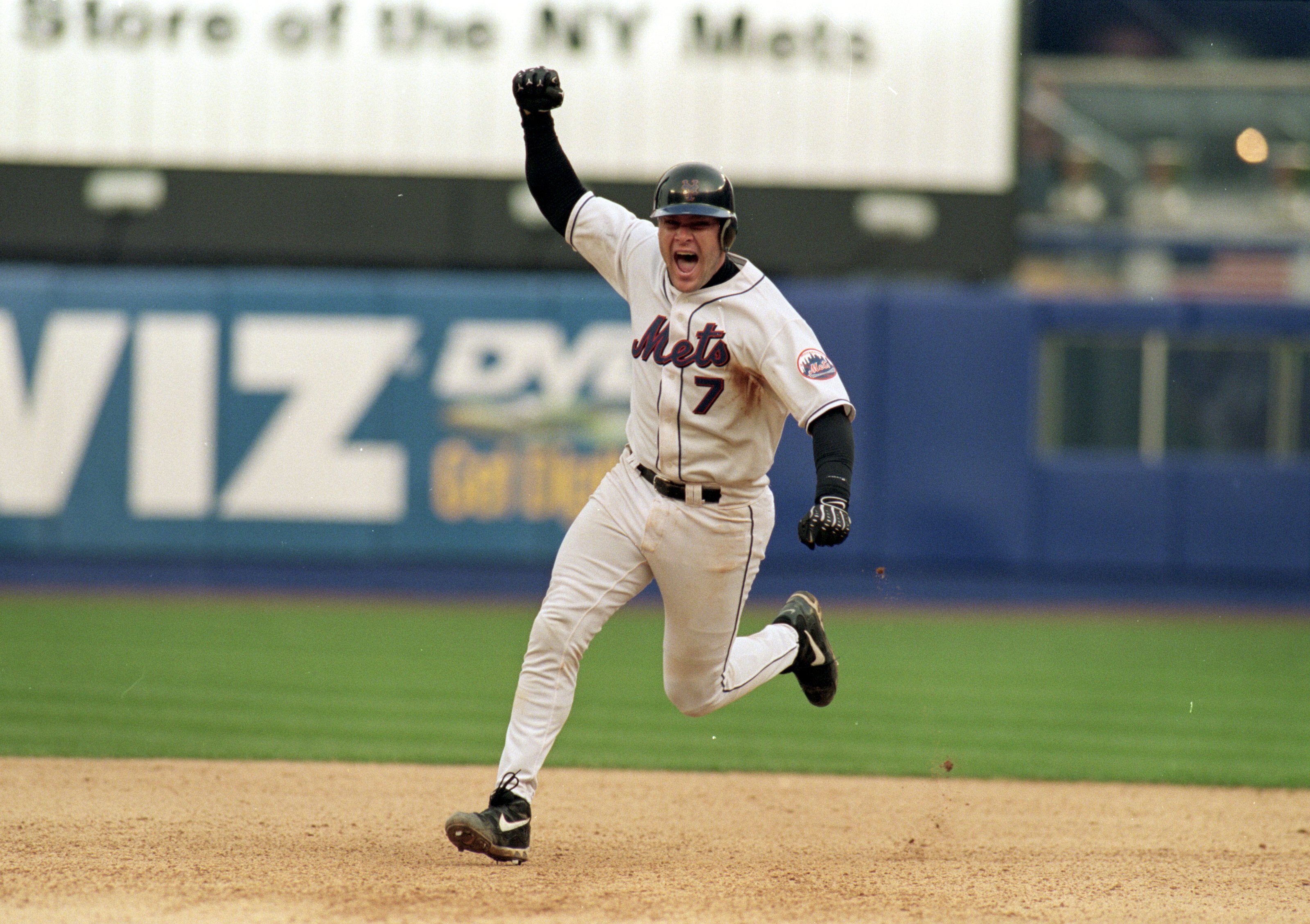 9 Oct 1999:  Catcher Todd Pratt #7 of the New York Mets celebrates as he rounds the bases after hitting the game winning home run in the 10 inning during Game Four of the National Lesgue Division Series against the Arizona DiamondBacks at Shea Stadium in