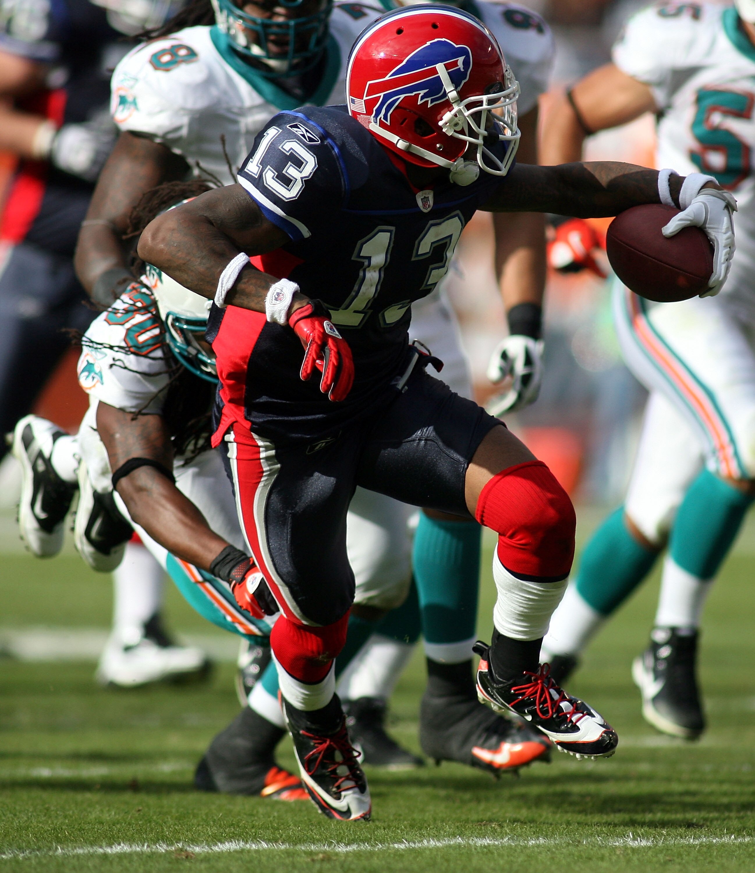 MIAMI - DECEMBER 19:  Receiver Steve Johnson #13 of the Buffalo Bills catches a pass  against the Miami Dolphins at Sun Life Stadium on December 19, 2010 in Miami, Florida.The Bills defeated the Dolphins 17-14.  (Photo by Marc Serota/Getty Images)