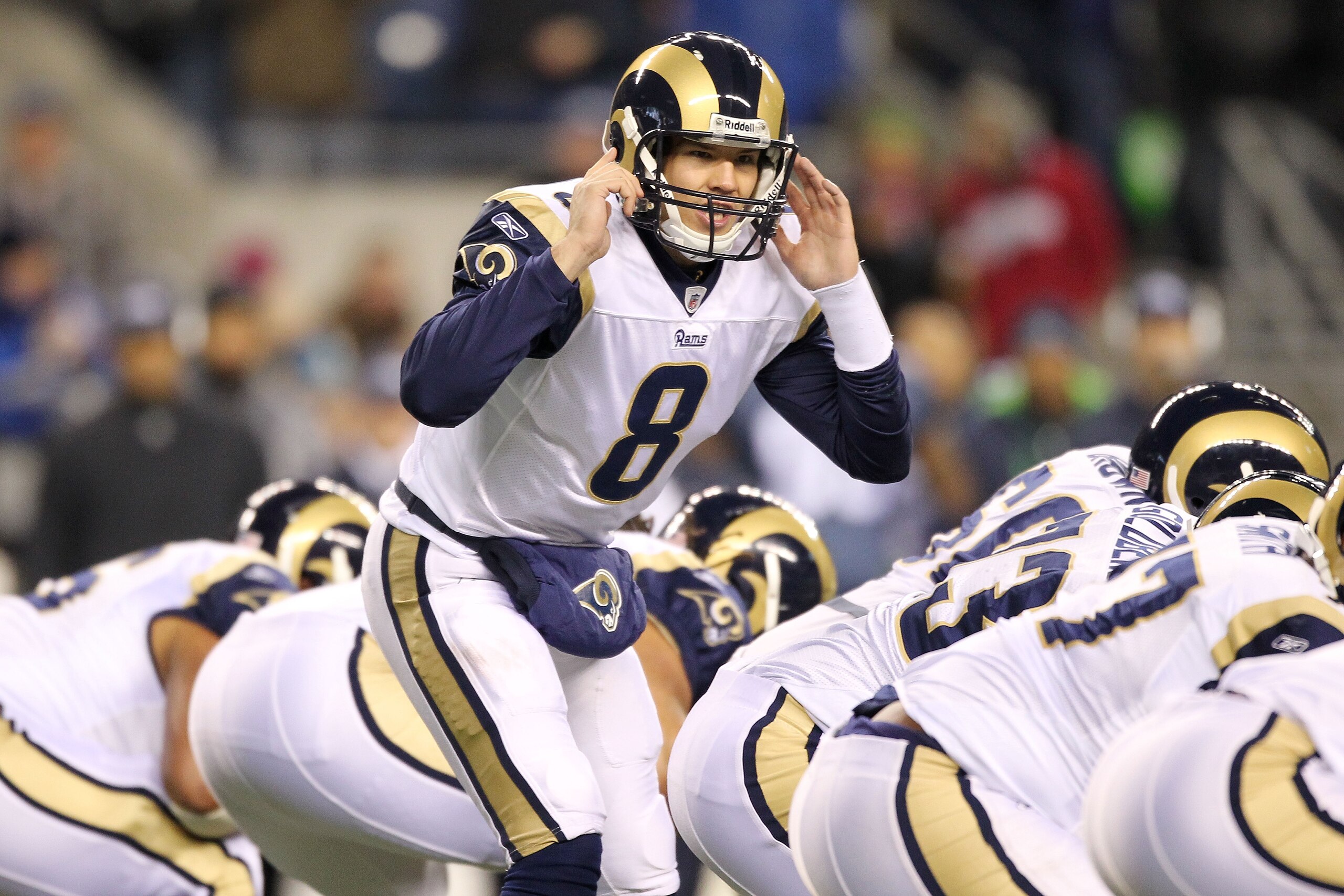 SEATTLE, WA - JANUARY 02:  Quarterback Sam Bradford #8 of the St. Louis Rams signals to his teammates during their game against the Seattle Seahawks at Qwest Field on January 2, 2011 in Seattle, Washington.  (Photo by Otto Greule Jr/Getty Images)