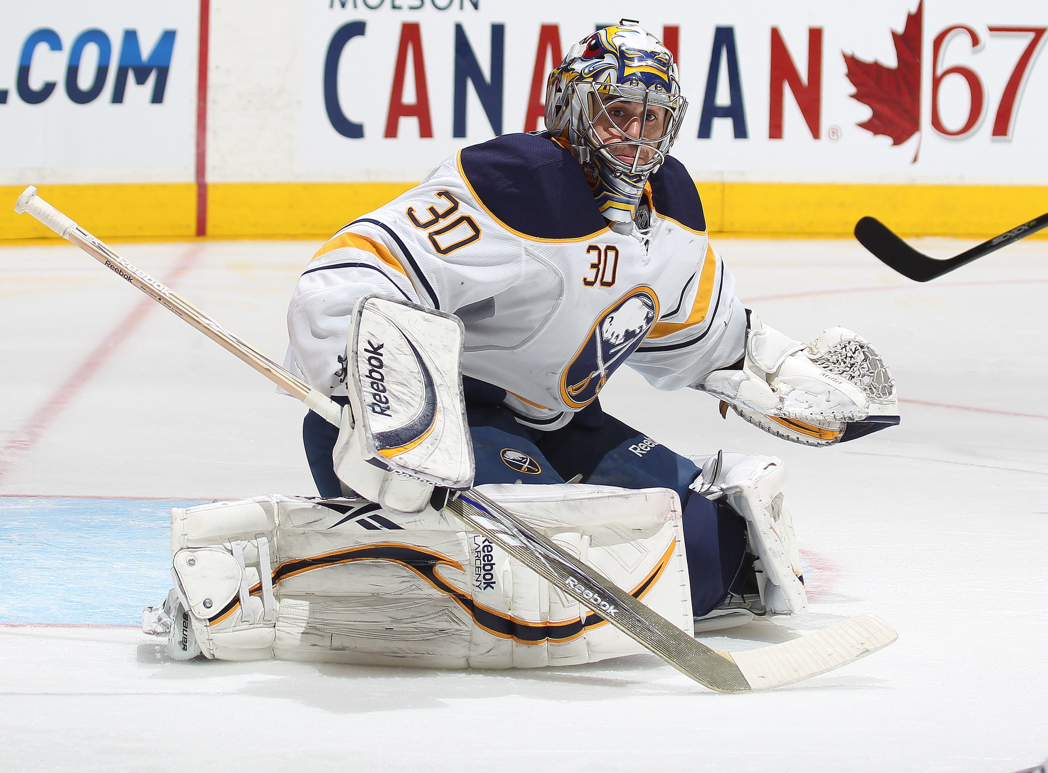 TORONTO, CANADA - MARCH 12:  Ryan Miller #30 of the Buffalo Sabres gets set to make a stop in a game against the Toronto Maple Leafs on March 12, 2011 at the Air Canada Centre in Toronto, Canada. The Leafs defeated the Sabres 4-3. (Photo by Claus Andersen