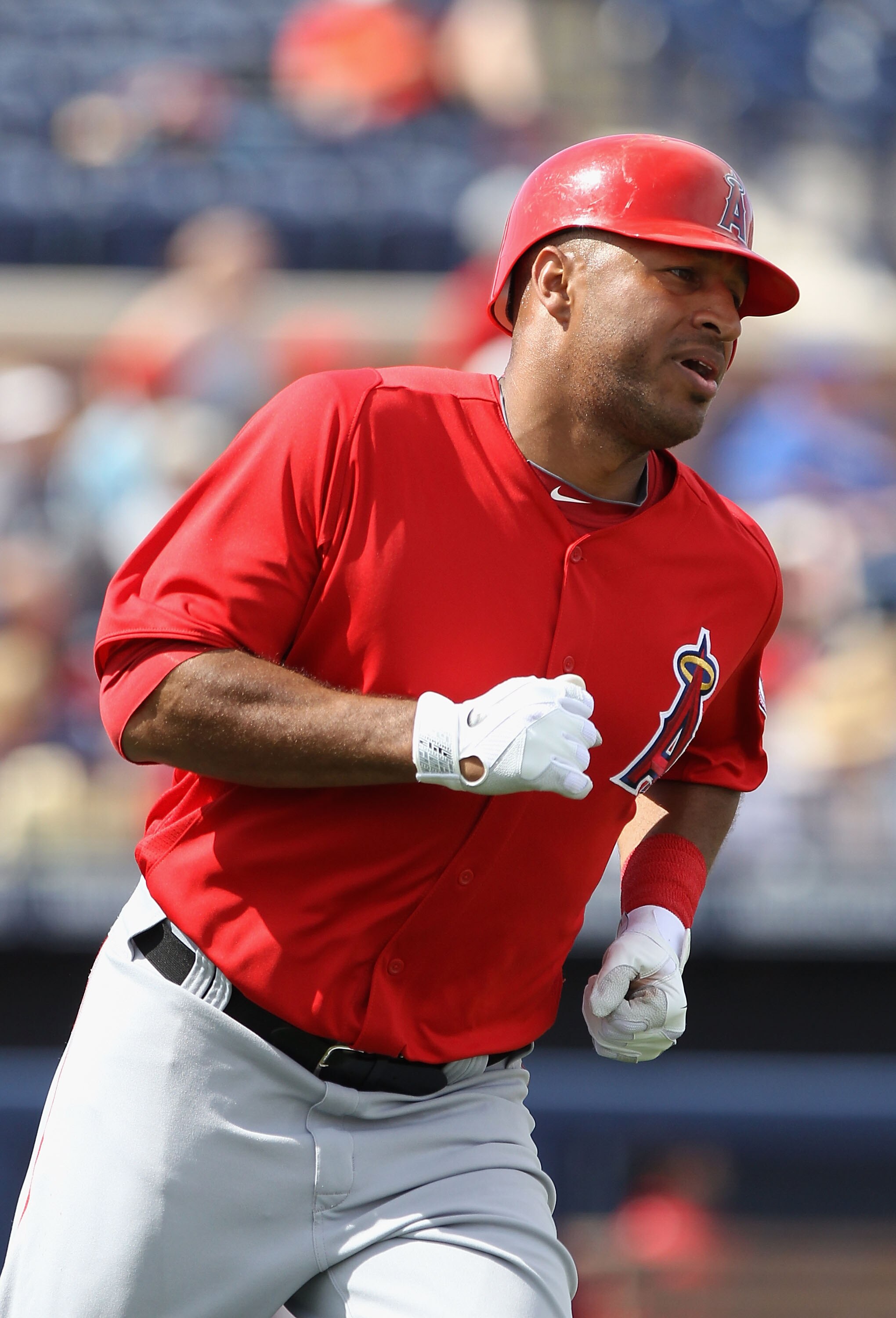 PEORIA, AZ - MARCH 15:  Vernon Wells #10 of the Los Angeles Angels of Anaheim runs to first base during the spring training game against the San Diego Padres at Peoria Stadium on March 15, 2011 in Peoria, Arizona.  (Photo by Christian Petersen/Getty Image