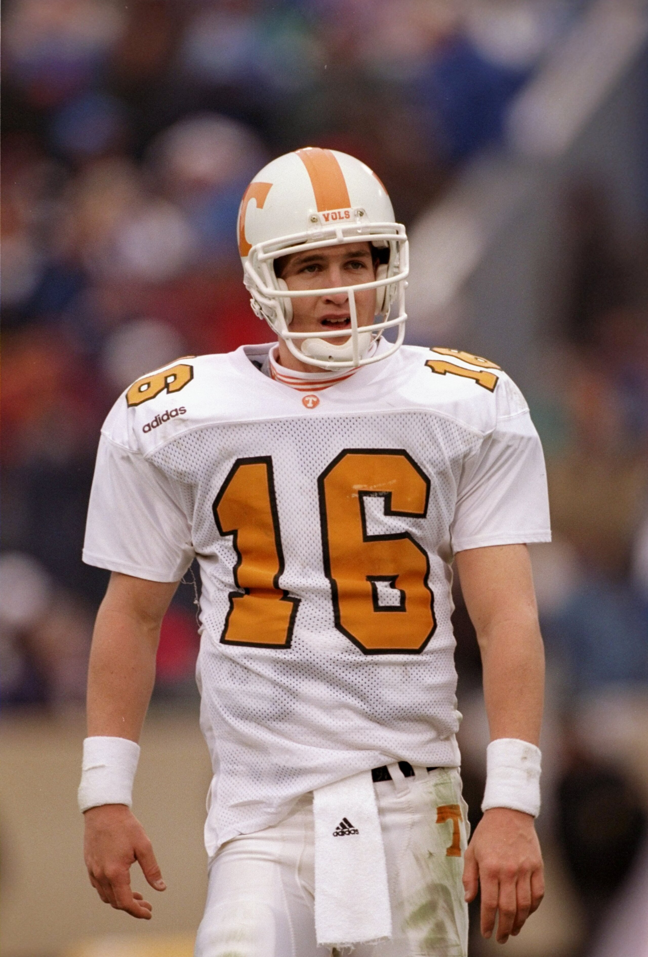 23 Nov 1997:   Quarterback Peyton Manning of the Tennessee Volunteers stands on the field during a game against the Kentucky Wildcats at Commonwealth Stadium in Lexington, Kentucky.  Tennessee won the game 59-31. Mandatory Credit: Rick Stewart  /Allsport
