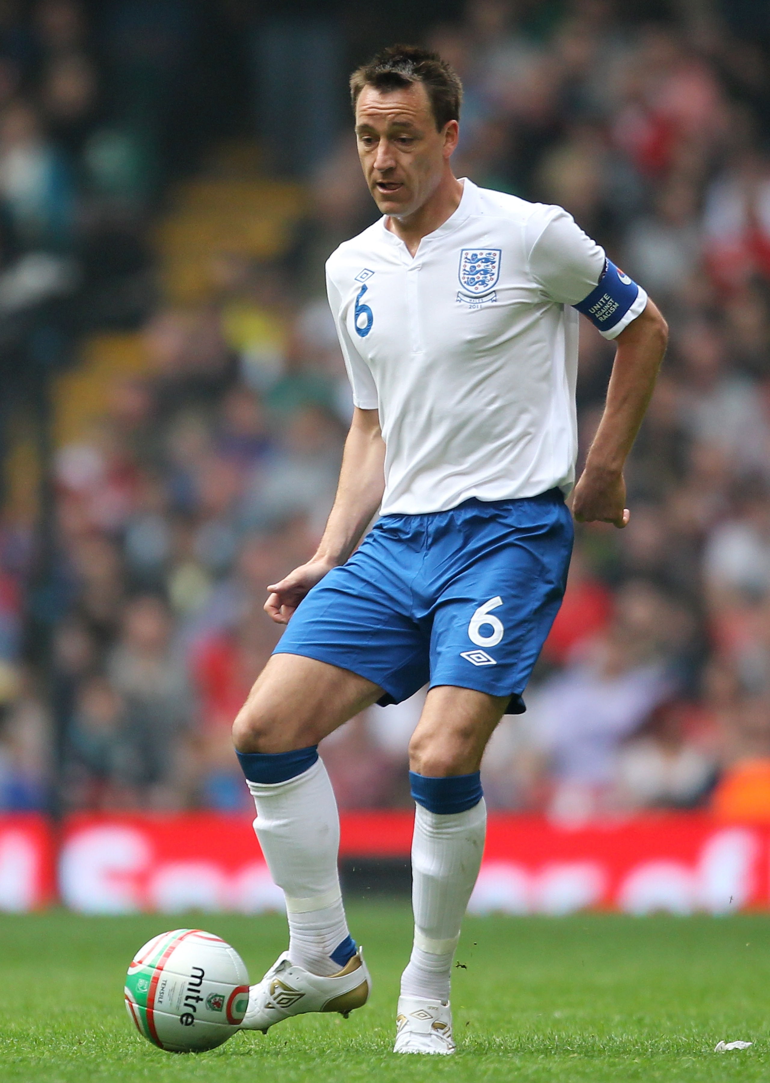 CARDIFF, WALES - MARCH 26: John Terry of England in action during the UEFA EURO 2012 Group G qualifying match between Wales and England at the Millennium Stadium on March 26, 2011 in Cardiff, Wales. (Photo by Alex Livesey/Getty Images) CARDIFF, WALES - MARCH 26: John Terry of England in action during the UEFA EURO 2012 Group G qualifying match between Wales and England at the Millennium Stadium on March 26, 2011 in Cardiff, Wales. (Photo by Alex Livesey/Getty Images)