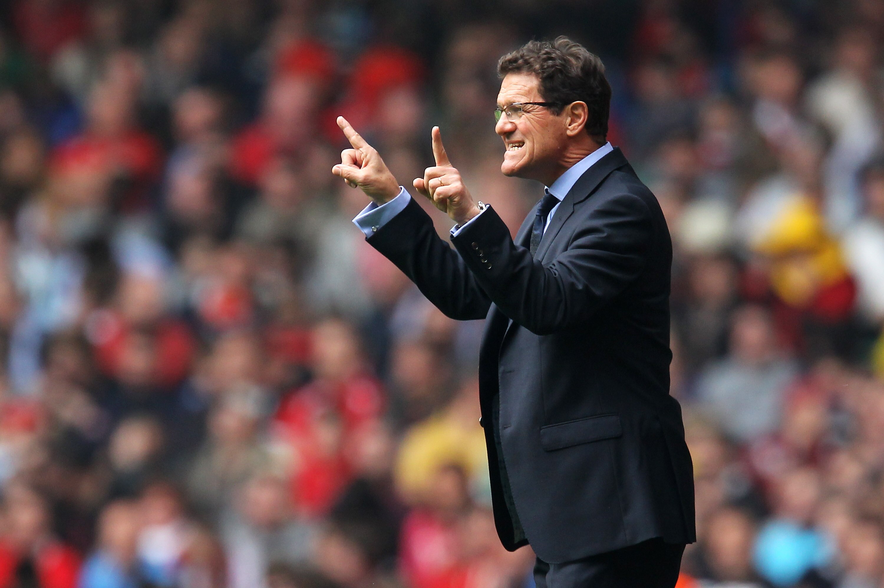 CARDIFF, WALES - MARCH 26:  England manager Fabio Capello gives instructions during the UEFA EURO 2012 Group G qualifying match between Wales and England at the Millennium Stadium on March 26, 2011 in Cardiff, Wales.  (Photo by Alex Livesey/Getty Images)