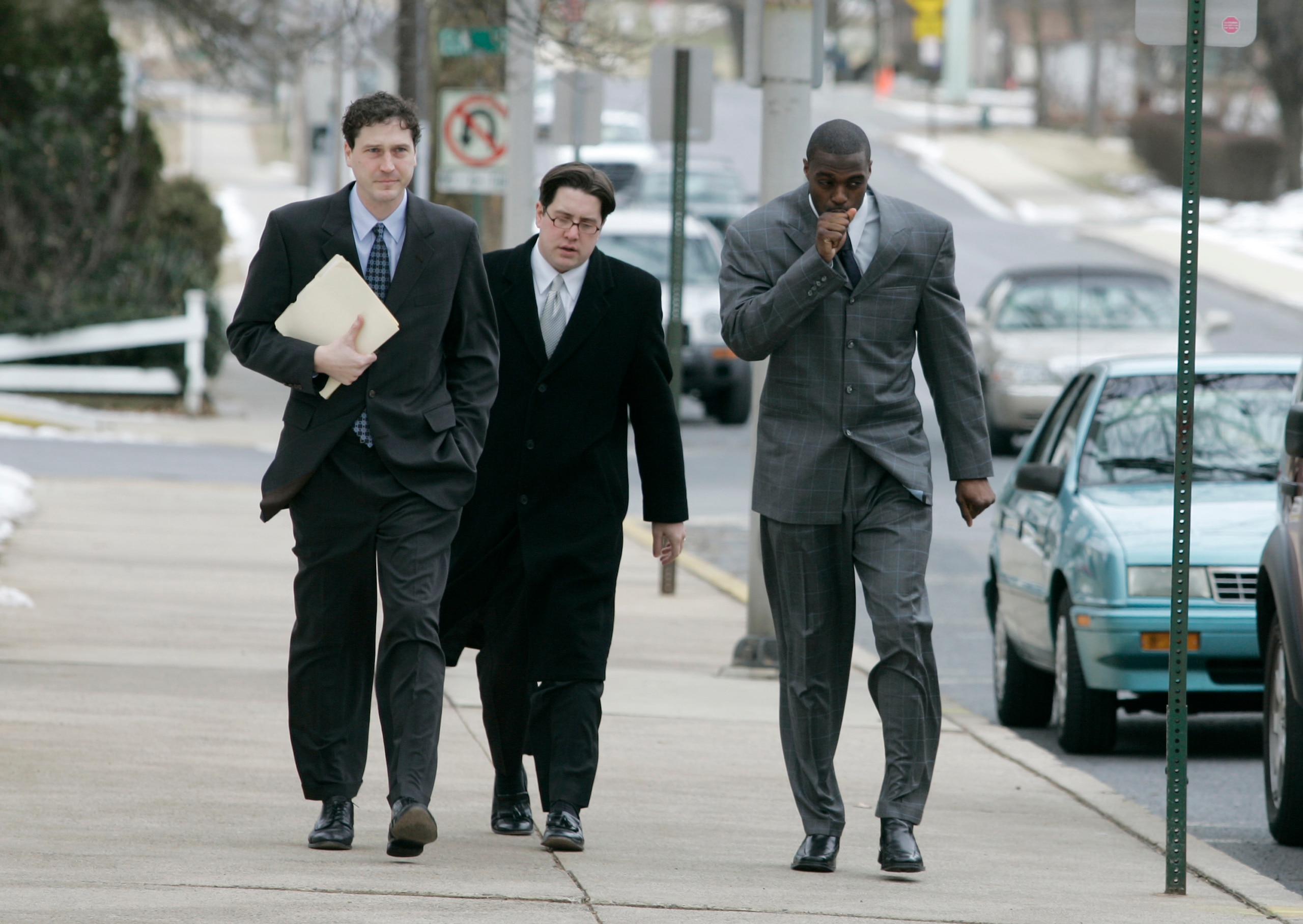LEBANON - JANUARY 14: New York Giants wide receiver Plaxico Burress, right, walks with members of his legal team as he arrives at the Lebanon County Courthouse January 14, 2009 in Lebanon, Pa. Burress is scheduled to appear in a civil trial in a dispute LEBANON - JANUARY 14: New York Giants wide receiver Plaxico Burress, right, walks with members of his legal team as he arrives at the Lebanon County Courthouse January 14, 2009 in Lebanon, Pa. Burress is scheduled to appear in a civil trial in a dispute