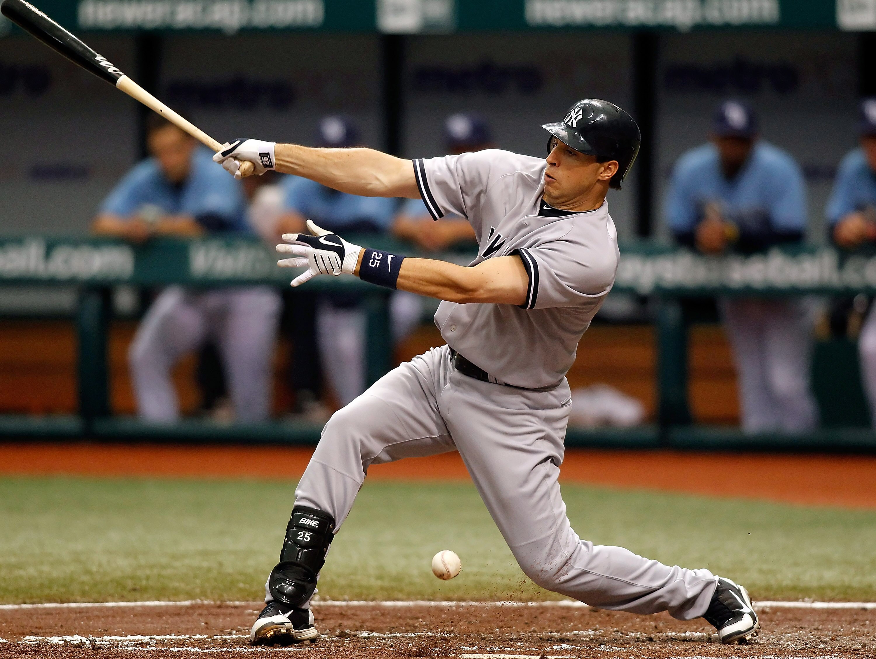 ST PETERSBURG, FL - APRIL 11:  First baseman Mark Teixeira #25 of the New York Yankees fouls off a pitch against the Tampa Bay Rays during the game at Tropicana Field on April 11, 2010 in St. Petersburg, Florida.  (Photo by J. Meric/Getty Images)