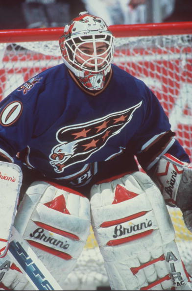 29 NOV 1995:  GOALKEEPER JIM CAREY OF THE WASHINGTON CAPITALS SITS IN GOAL DURING THE CAPITALS 2-2 TIE WITH THE ANAHEIM MIGHTY DUCKS AT THE POND IN ANAHEIM, CALIFORNIA.   Mandatory Credit: Glenn Cratty/ALLSPORT