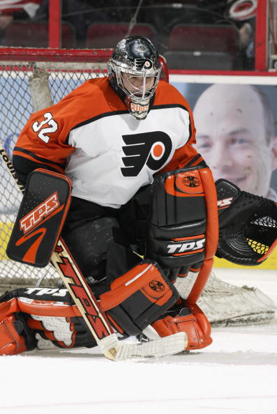 RALEIGH, NC - NOVEMBER 5:  Roman Cechmanek #32 of the Philadelphia Flyers in goal against the Carolina Hurricanes on November 5, 2002 at the RBC Center in Raleigh, North Carolina.  (Photo by Craig Jones/Getty Images/NHLI)