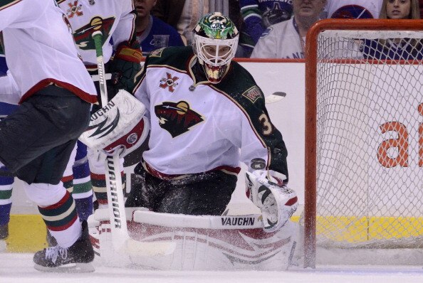 VANCOUVER, CANADA - MARCH 14: Goalie Niklas Backstrom #32 of the Minnesota Wild watches the puck bounce off him after making a save against the Vancouver Canucks during the third period in NHL action on March 14, 2011 at Rogers Arena in Vancouver, British