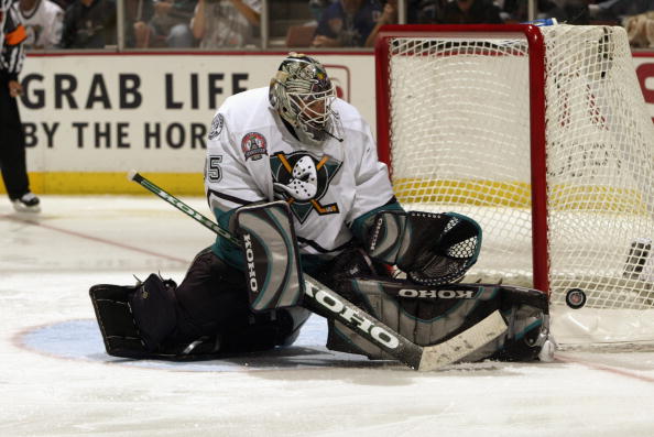 ANAHEIM, CA - JUNE 7:  Goalie Jean-Sebastien Giguere #35 of the Anaheim Mighty Ducks makes a save against the New Jersey Devils during the third period in Game Six of the 2003 Stanley Cup Finals at the Arrowhead Pond of Anaheim on June 7, 2003 in Anaheim,