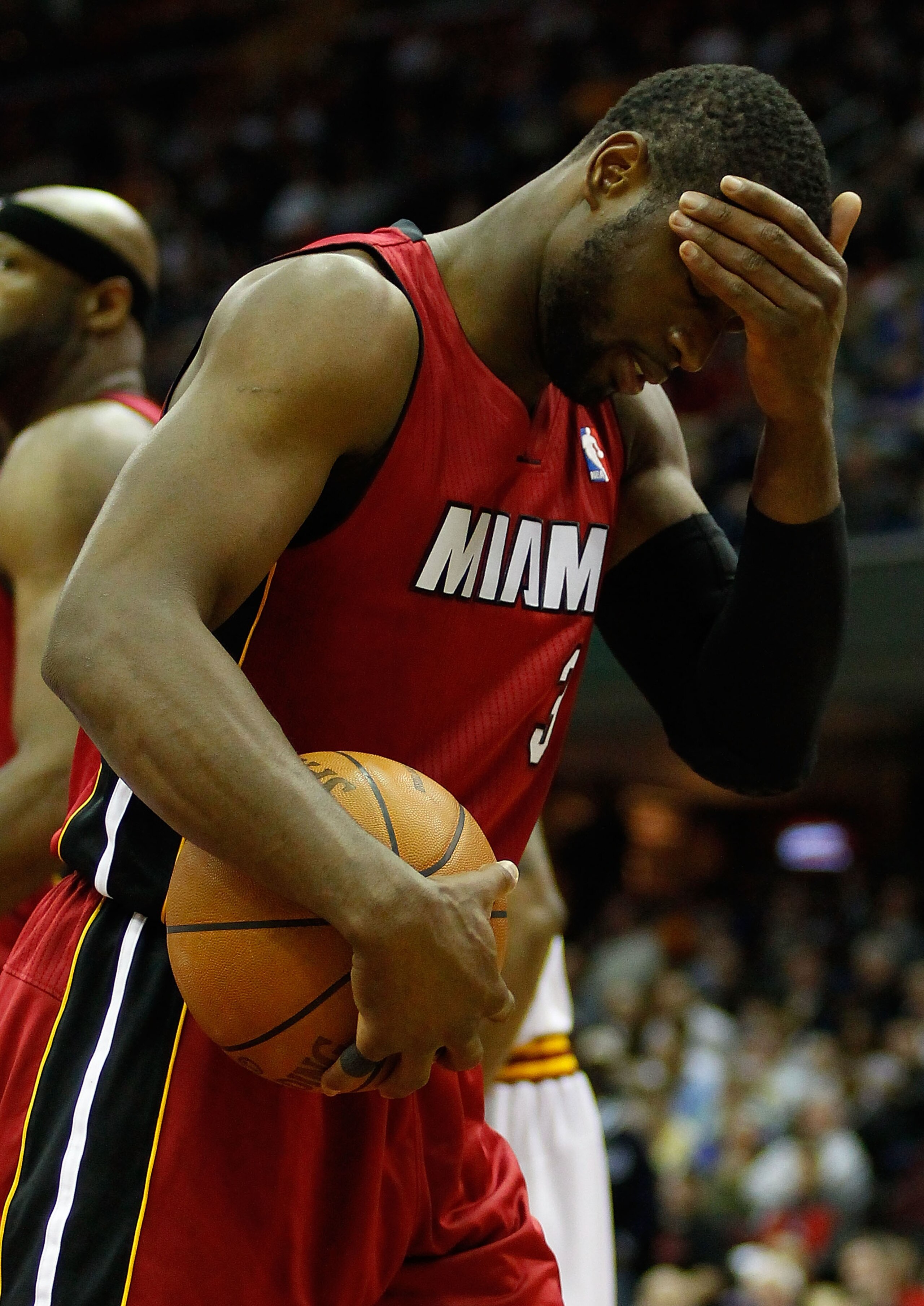 CLEVELAND - MARCH 29: Dwyane Wade #3 of the Miami Heat reacts after a foul was called during the game against the Cleveland Cavaliers on March 29, 2011 at Quicken Loans Arena in Cleveland, Ohio. NOTE TO USER: User expressly acknowledges and agrees that, b