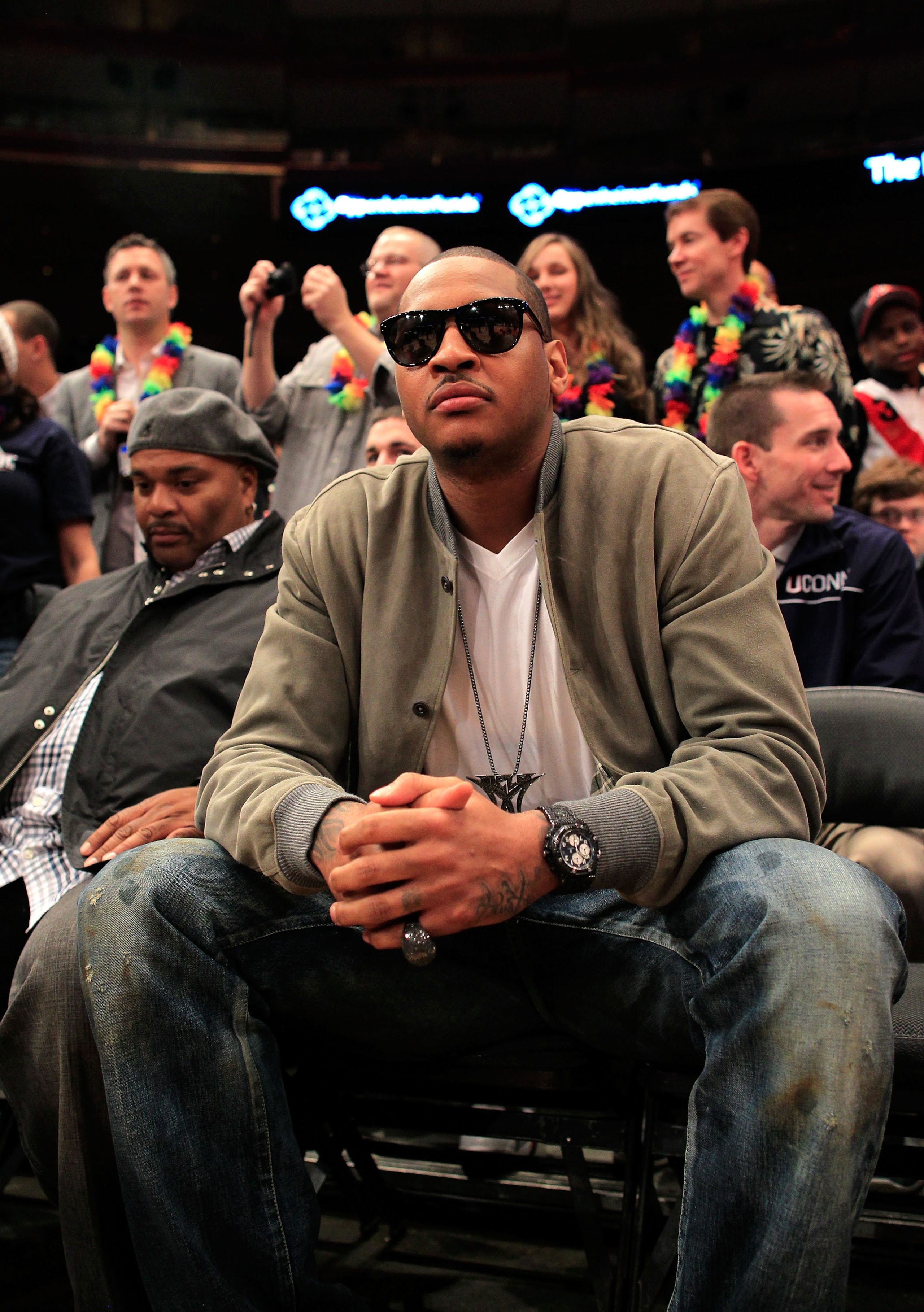NEW YORK, NY - MARCH 12:  NBA player Carmelo Anthony of the New York Knicks attends the game between the Connecticut Huskies and the Louisville Cardinals during the championship of the 2011 Big East Men's Basketball Tournament presented by American Eagle