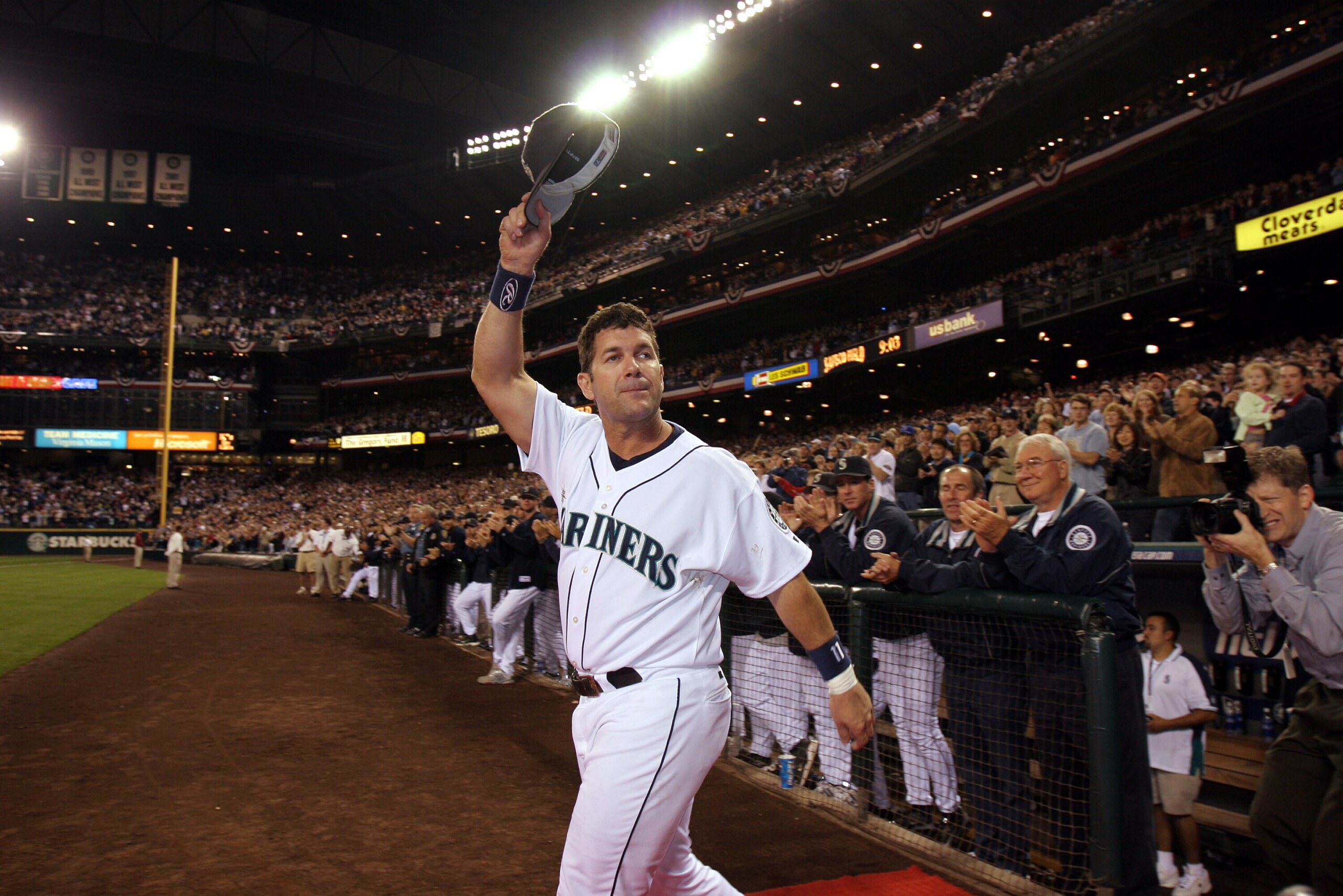 SEATTLE - OCTOBER 2:  Edgar Martinez #11 of the Seattle Mariners waves to fans as he takes the field during a post game ceremony honoring his career as a Mariner after the game against the Seattle Mariners on October 2, 2004 at Safeco Field in Seattle, Wa