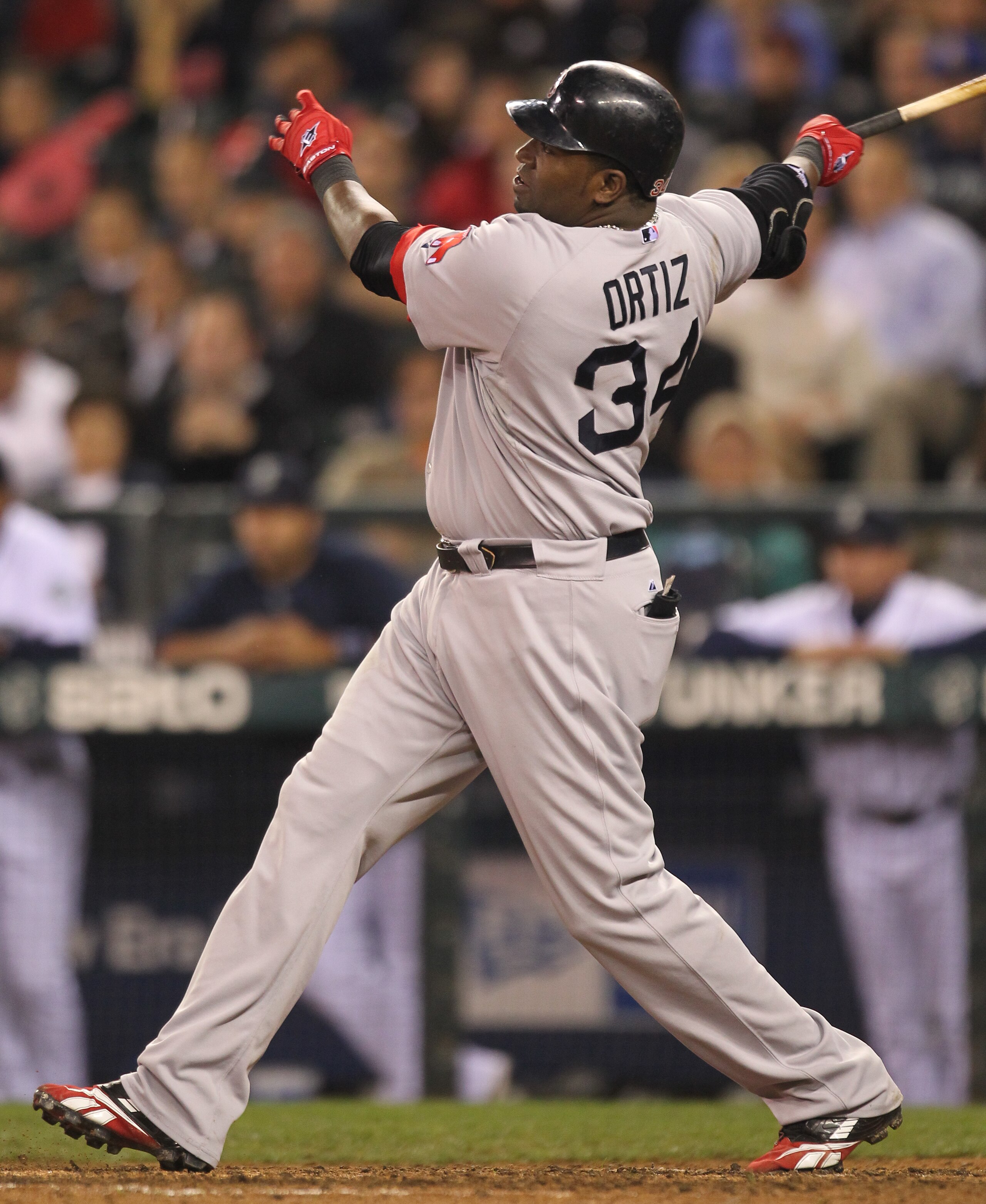 SEATTLE - SEPTEMBER 14:  David Ortiz #34 of the Boston Red Sox hits a three run homer in the eighth inning against the Seattle Mariners at Safeco Field on September 14, 2010 in Seattle, Washington. The Red Sox won 9-6. (Photo by Otto Greule Jr/Getty Image